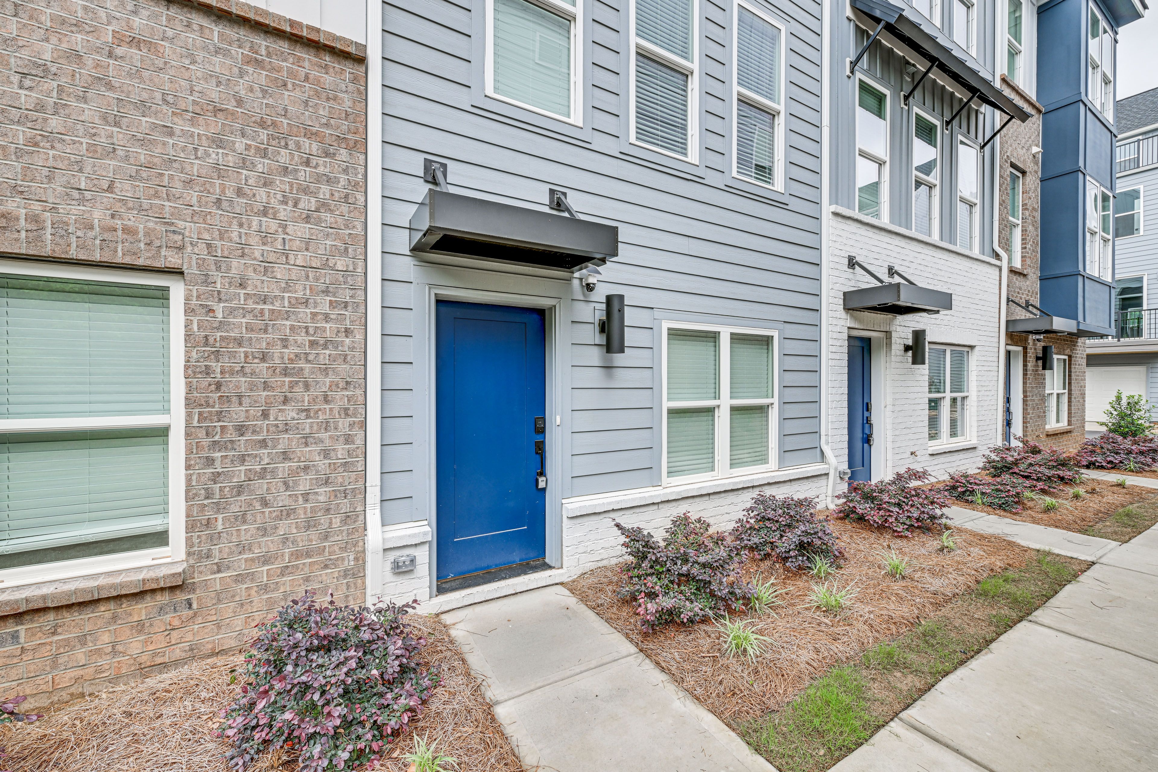 Property Exterior | Multi-Level Townhome | Keyless Entry