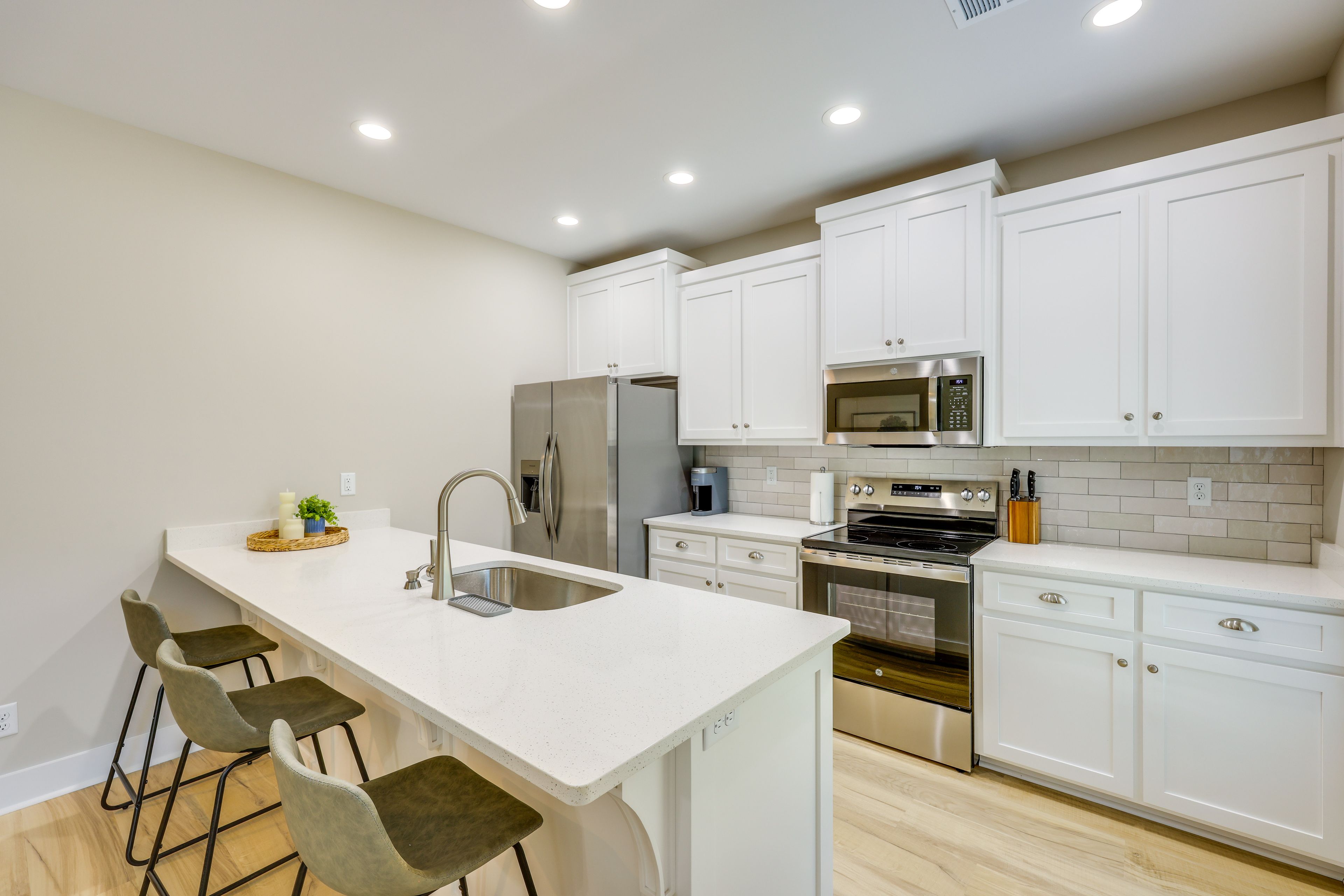Kitchen | In-Unit Laundry | Central Heating & A/C