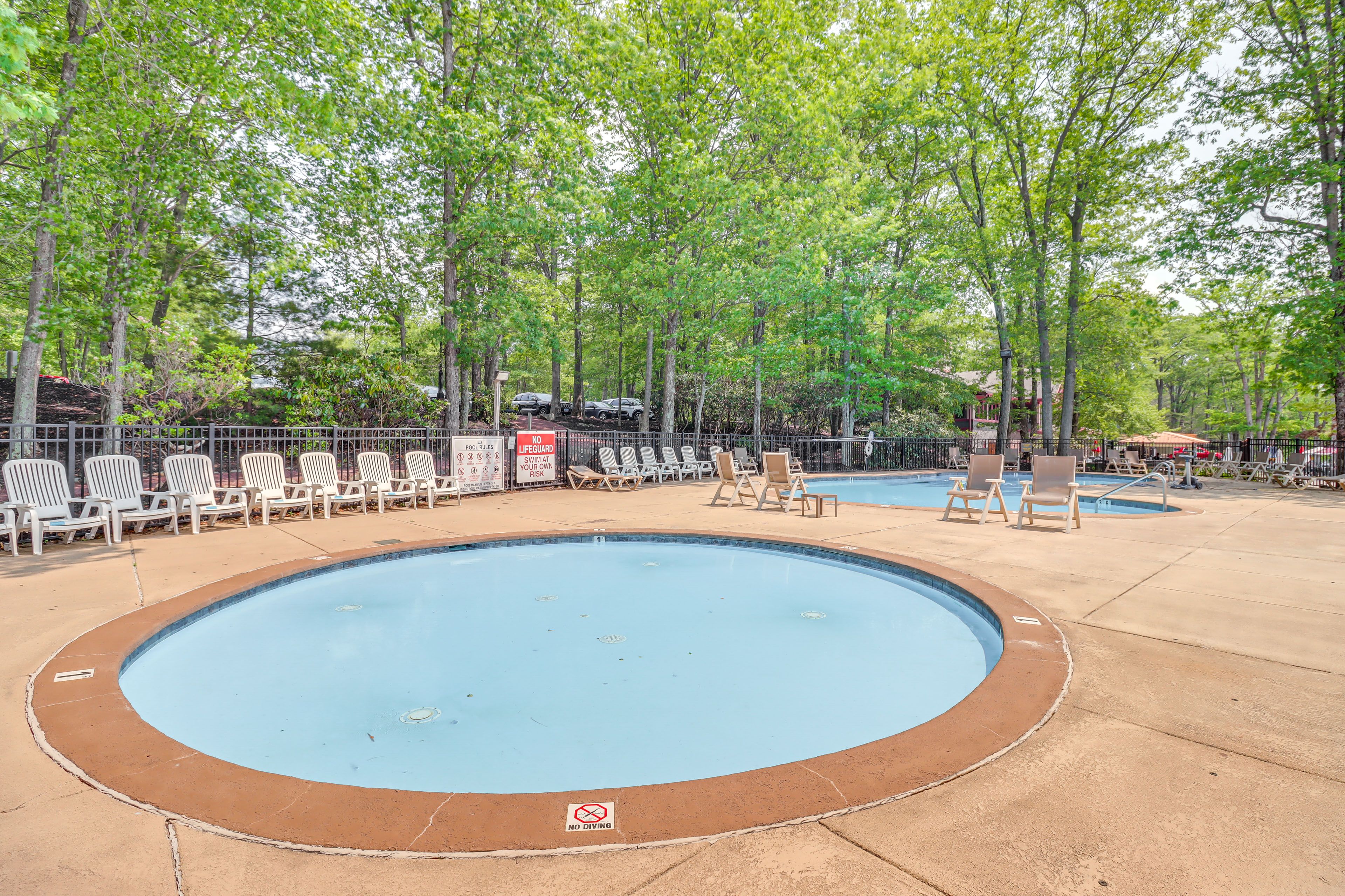 Snow Ridge Village | Community Pool Area | 2-Story Townhome