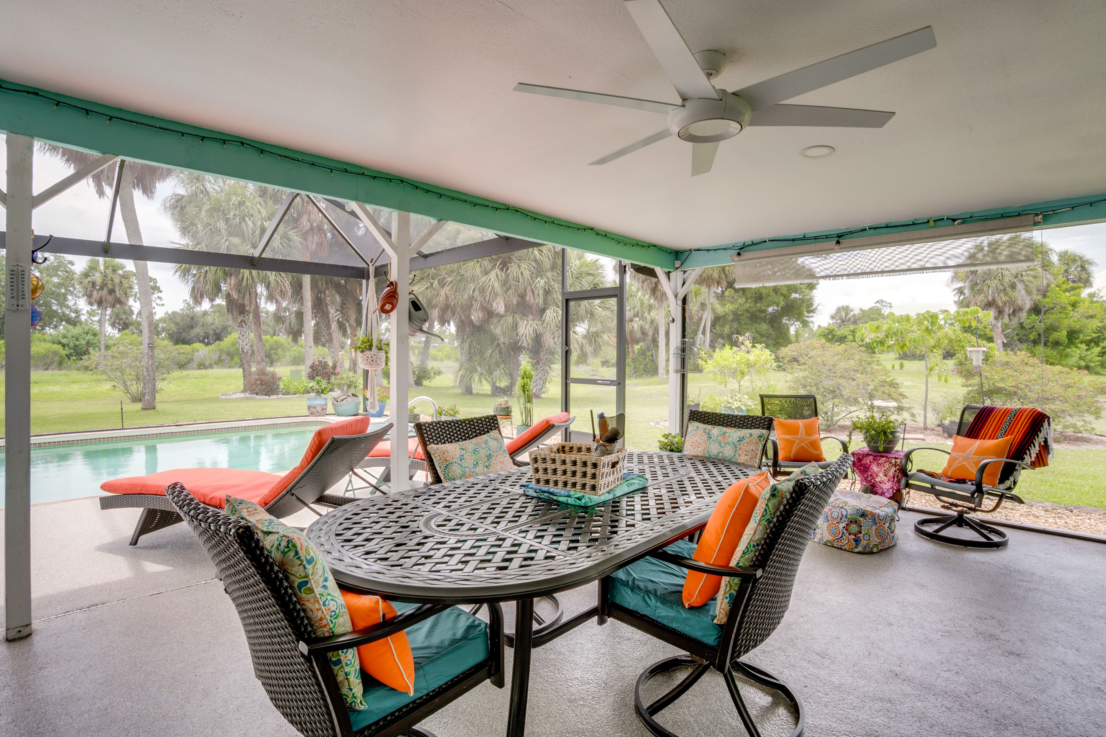 House Exterior | Furnished Lanai | Dining Area | Gas Grill