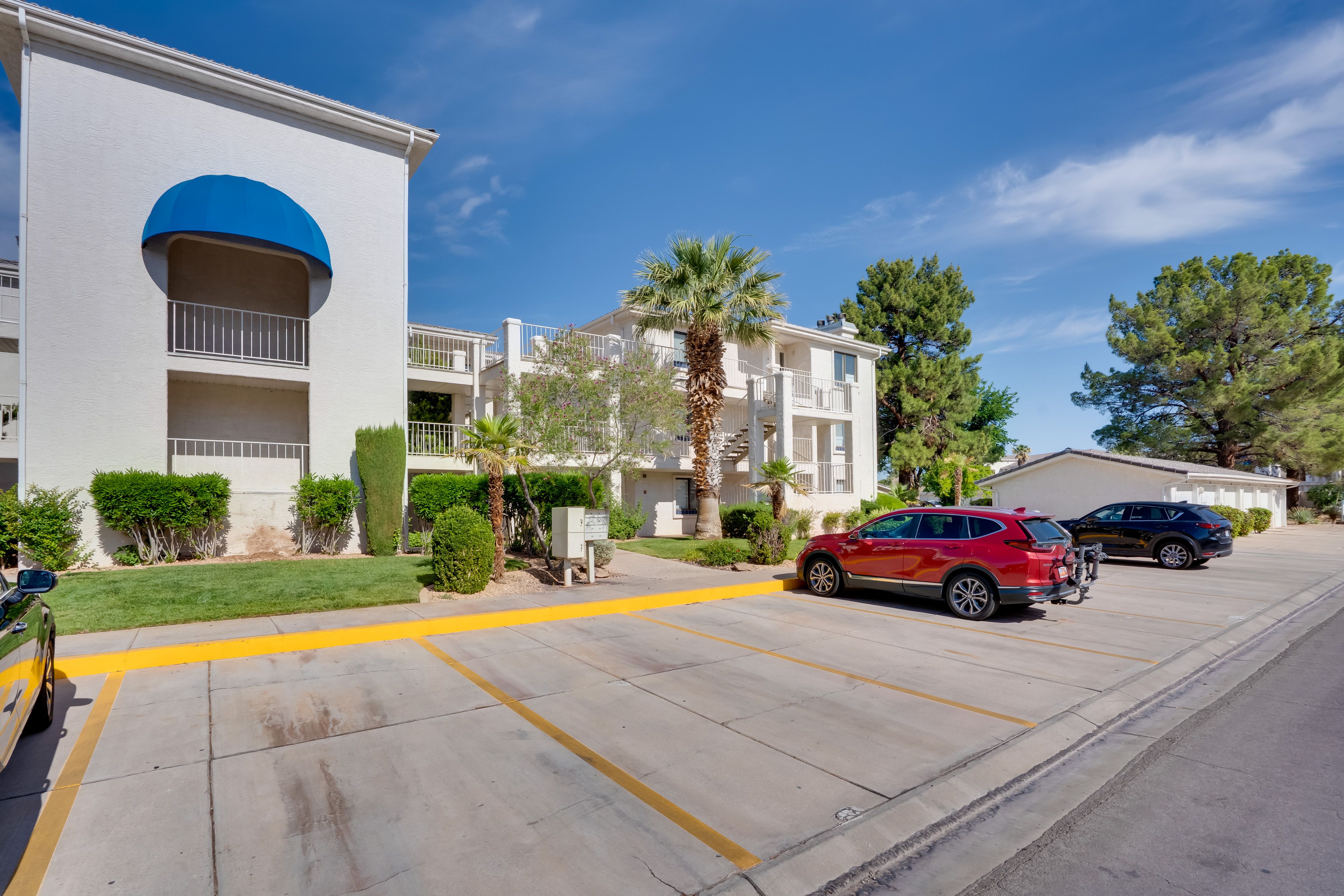 Parking | Community Lot (1 Vehicle) | In Front of Garage (1 Vehicle)