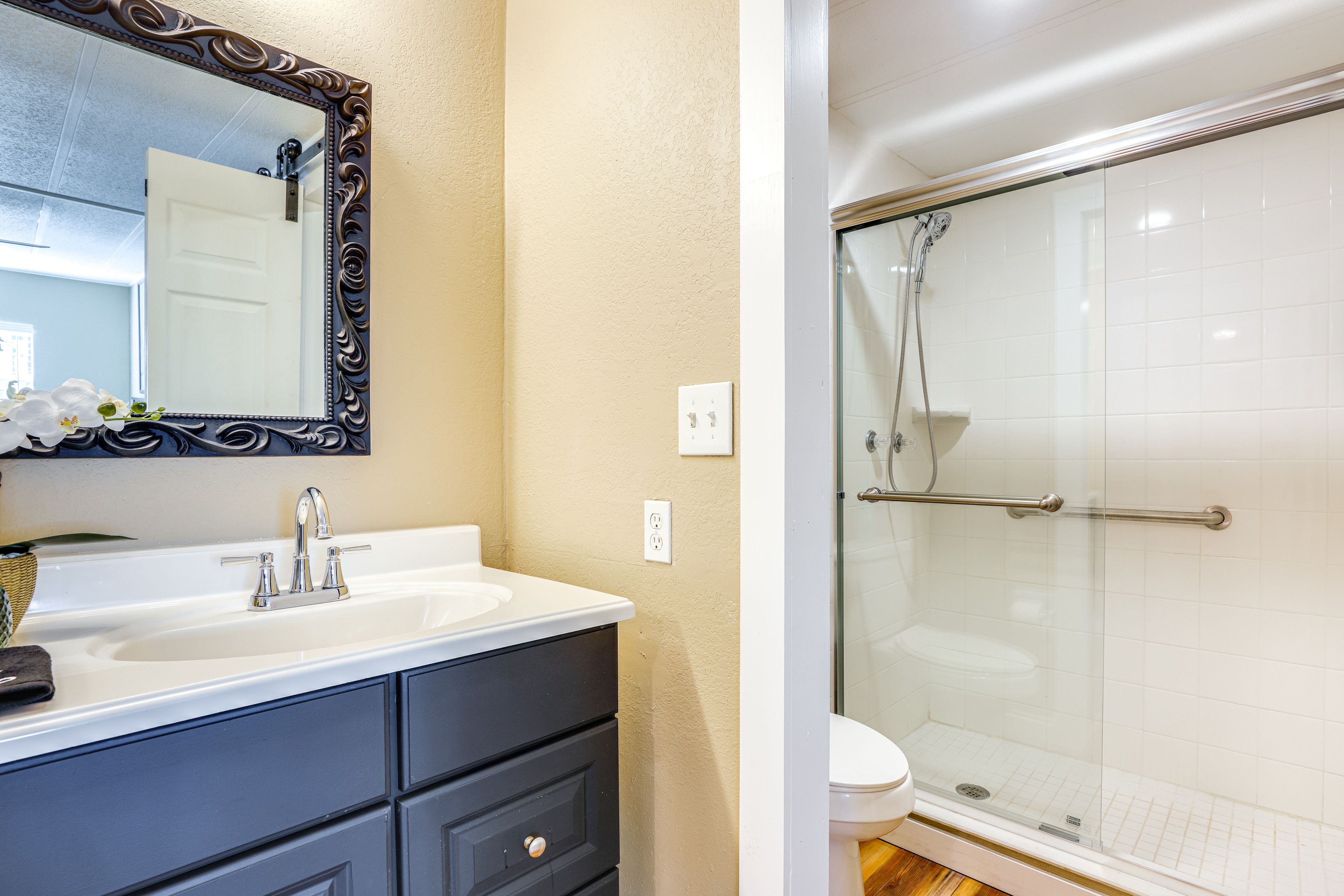 En-Suite Bathroom | Shower w/ Grab Rail | Towels Provided