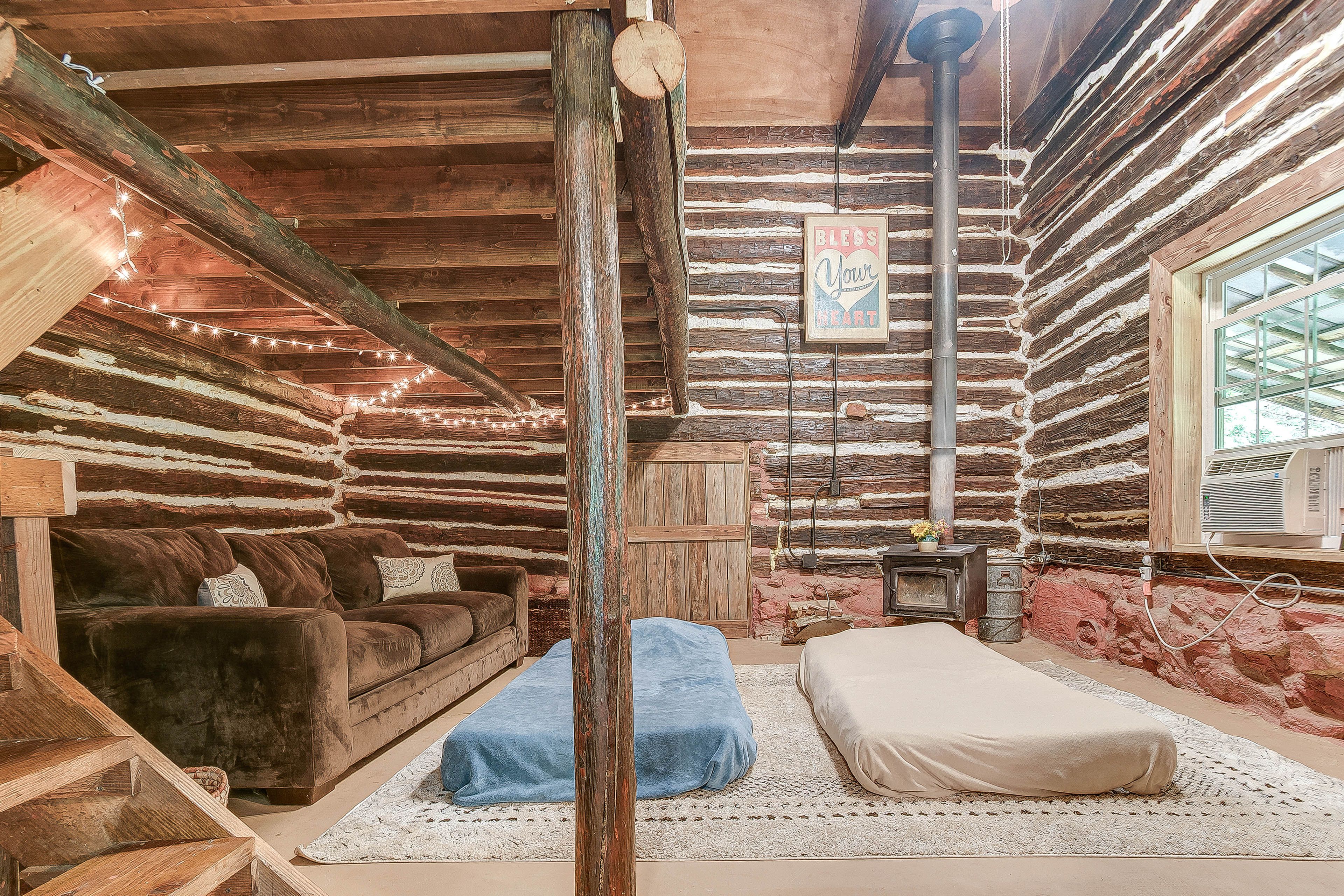 Bedroom | Queen Bed (Stairs Required) | 2 Twin Floor Mattresses