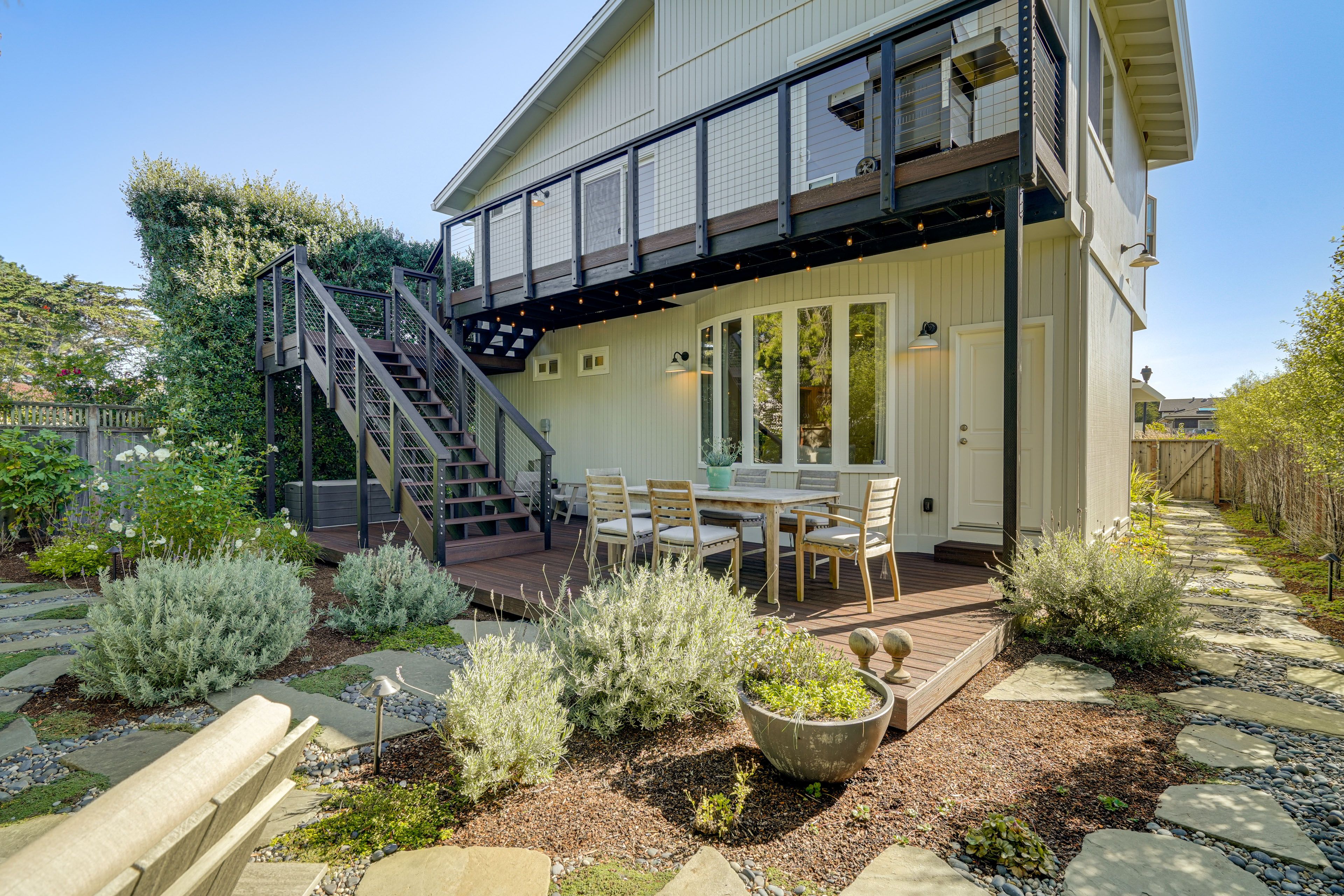 House Exterior | Balcony w/ Gas Grill | Deck w/ Dining Area