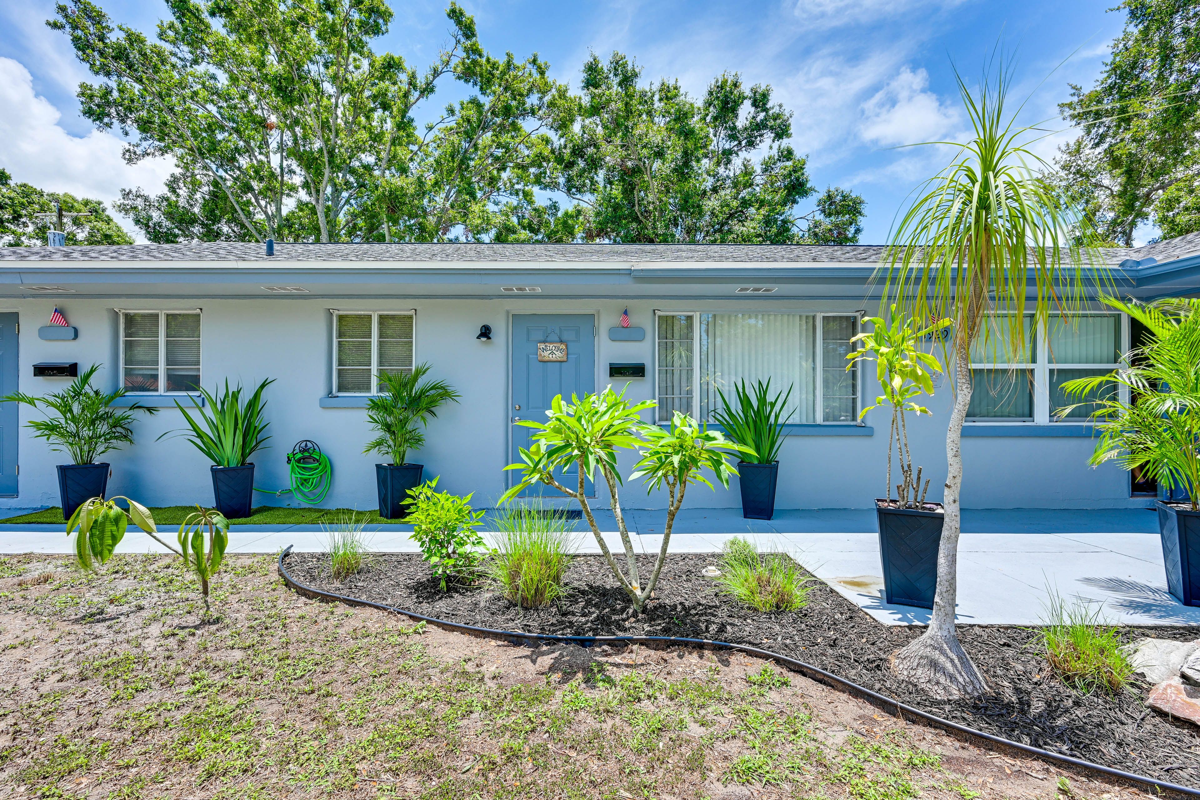 Unit Entrance | Shared Driveway (2 Vehicles)