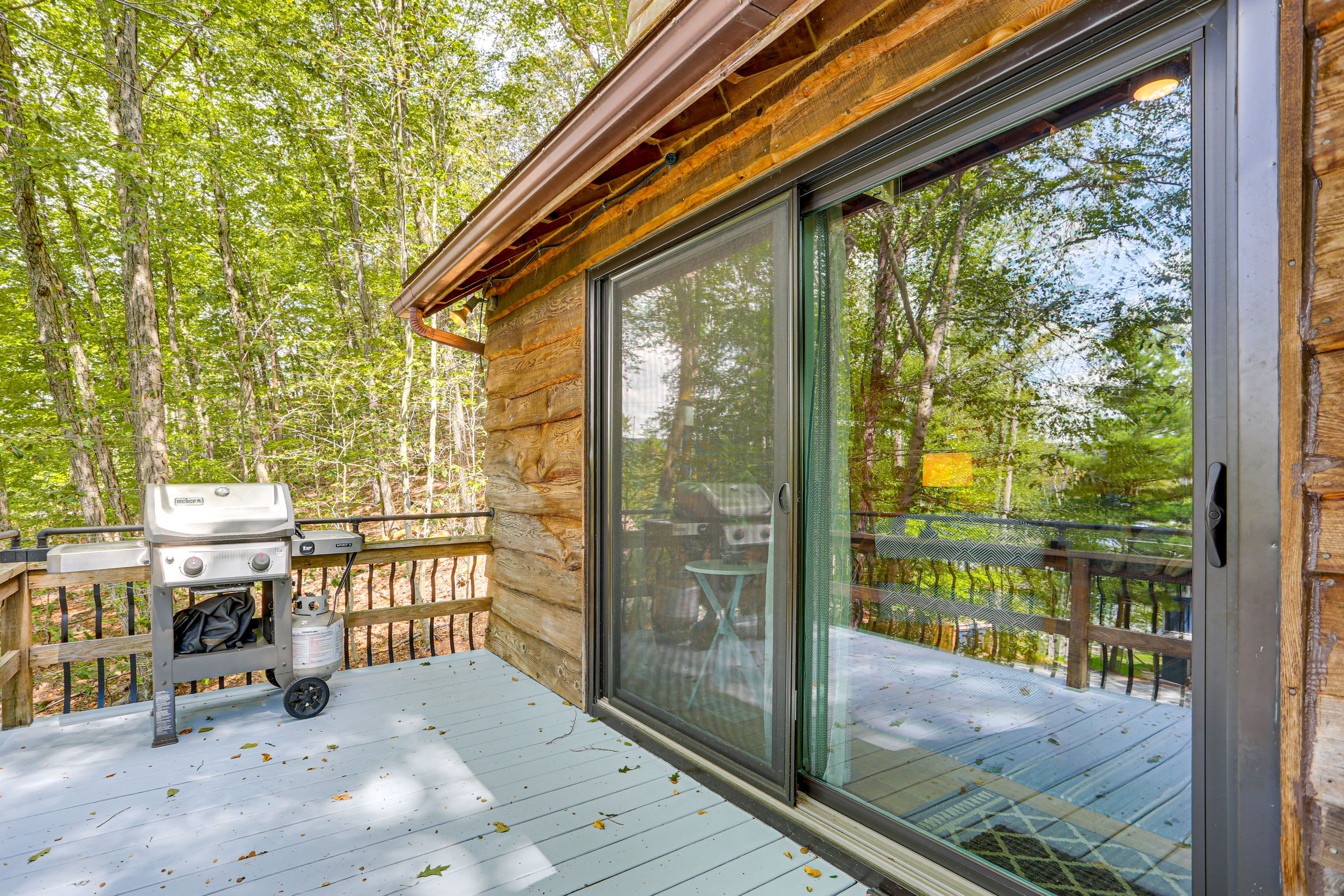 Wraparound Deck | Dining Area | Rocking Chairs | Gas Grill