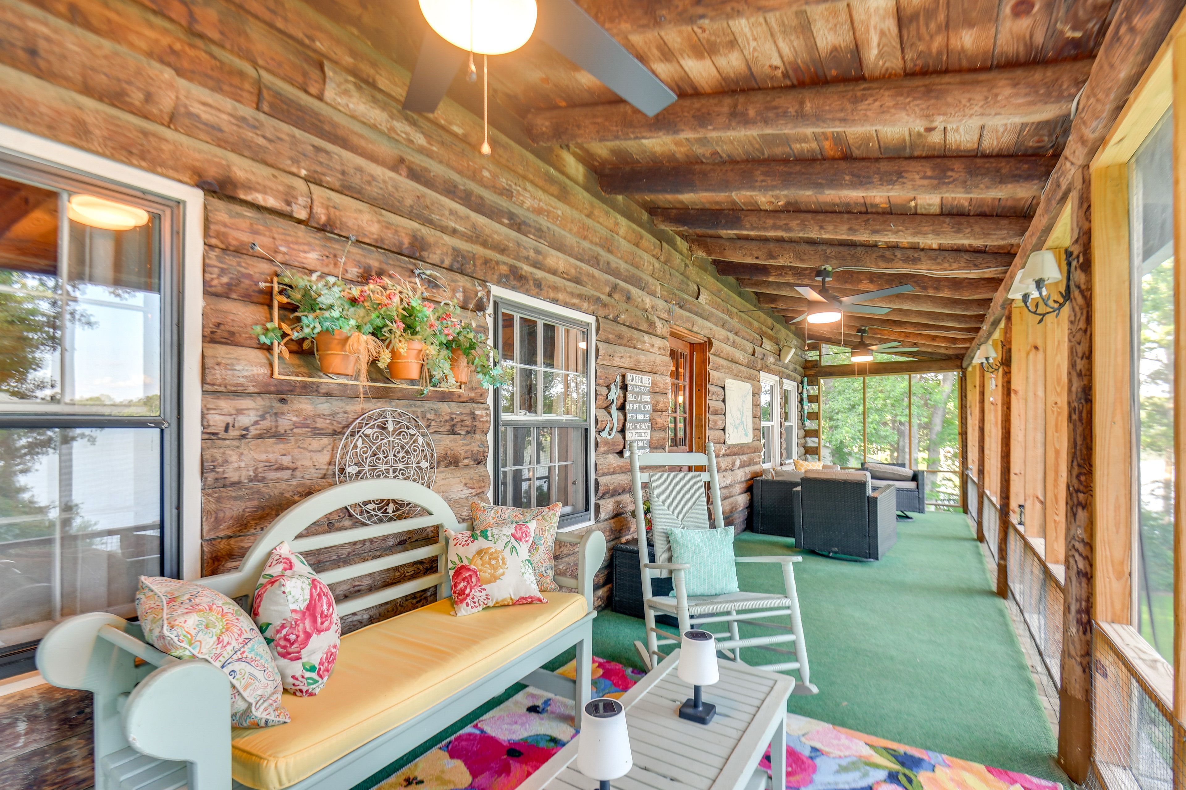 Cabin Exterior | Screened Deck w/ Seating | Lake Views