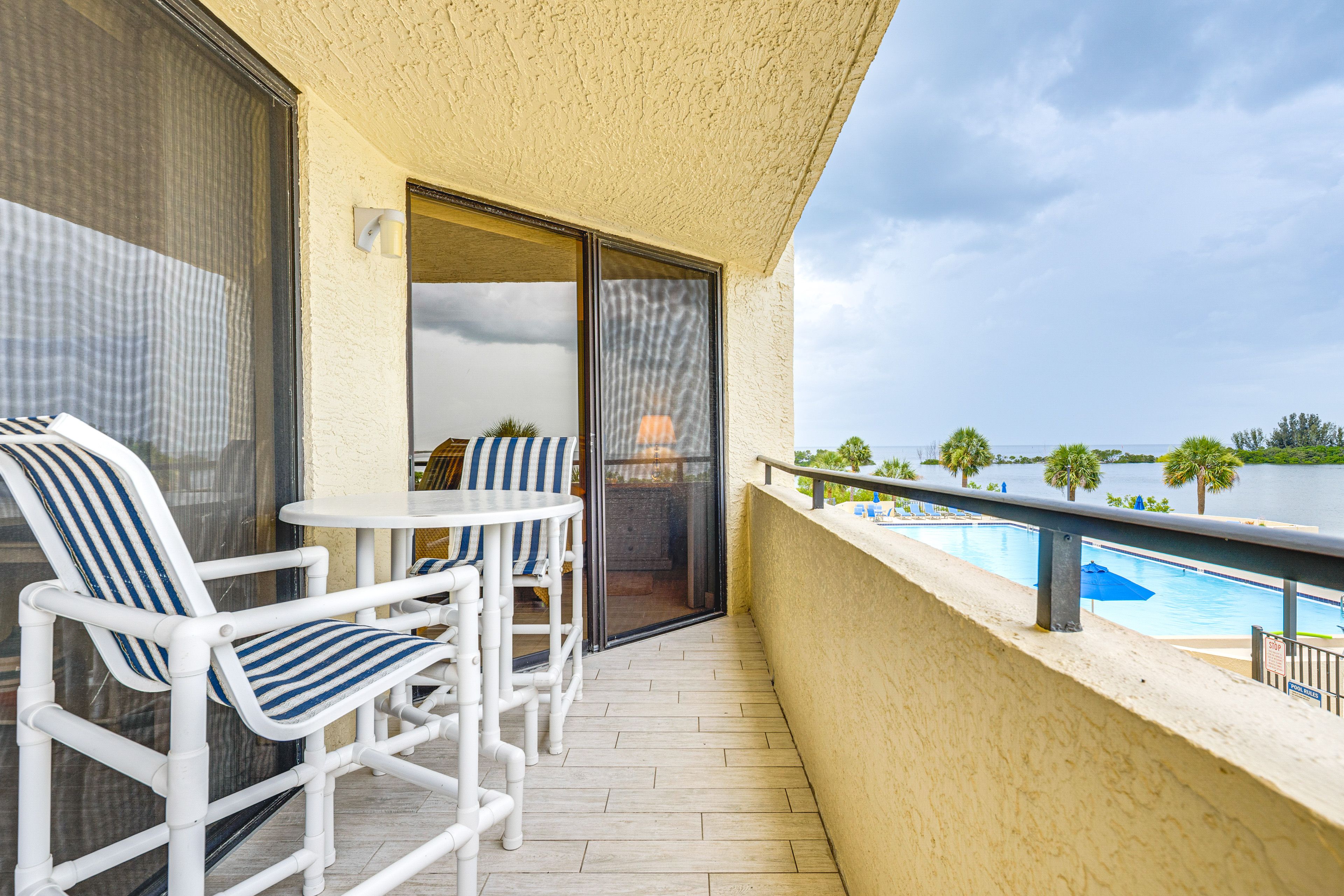 Balcony | Outdoor Dining Area | Pool & Ocean Views