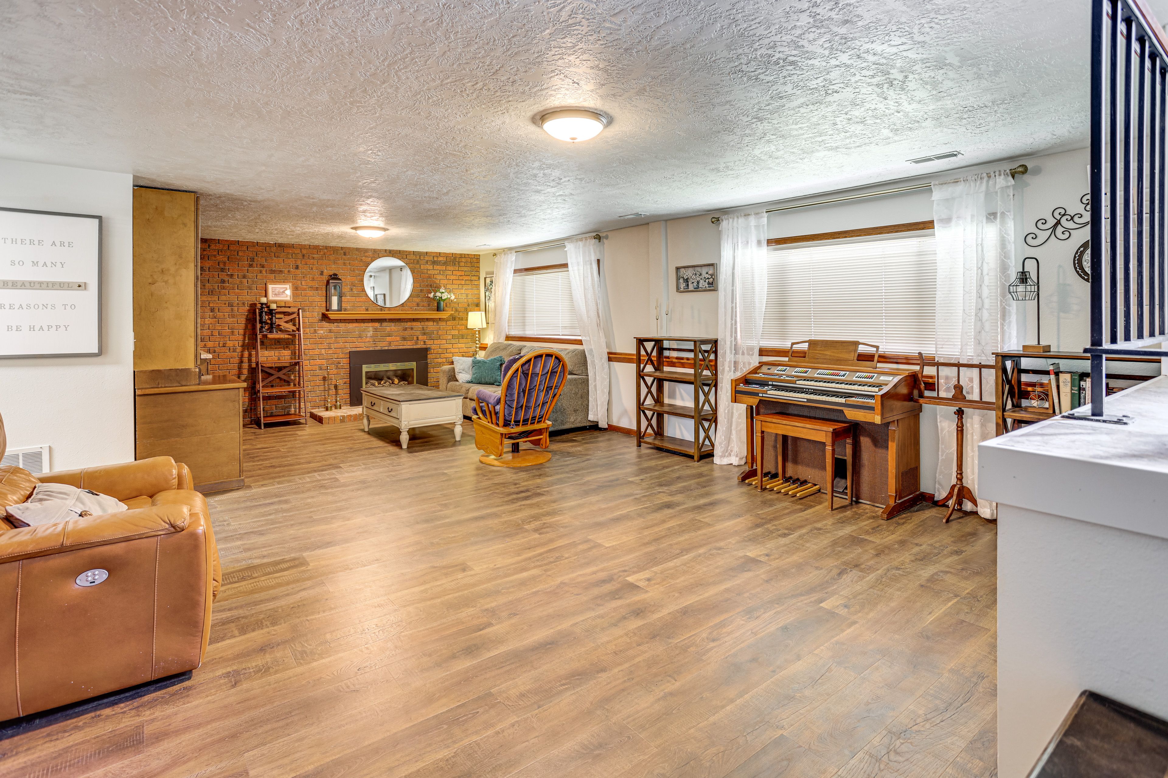 Basement Living Room | Full Sleeper Sofa | Lower Floor