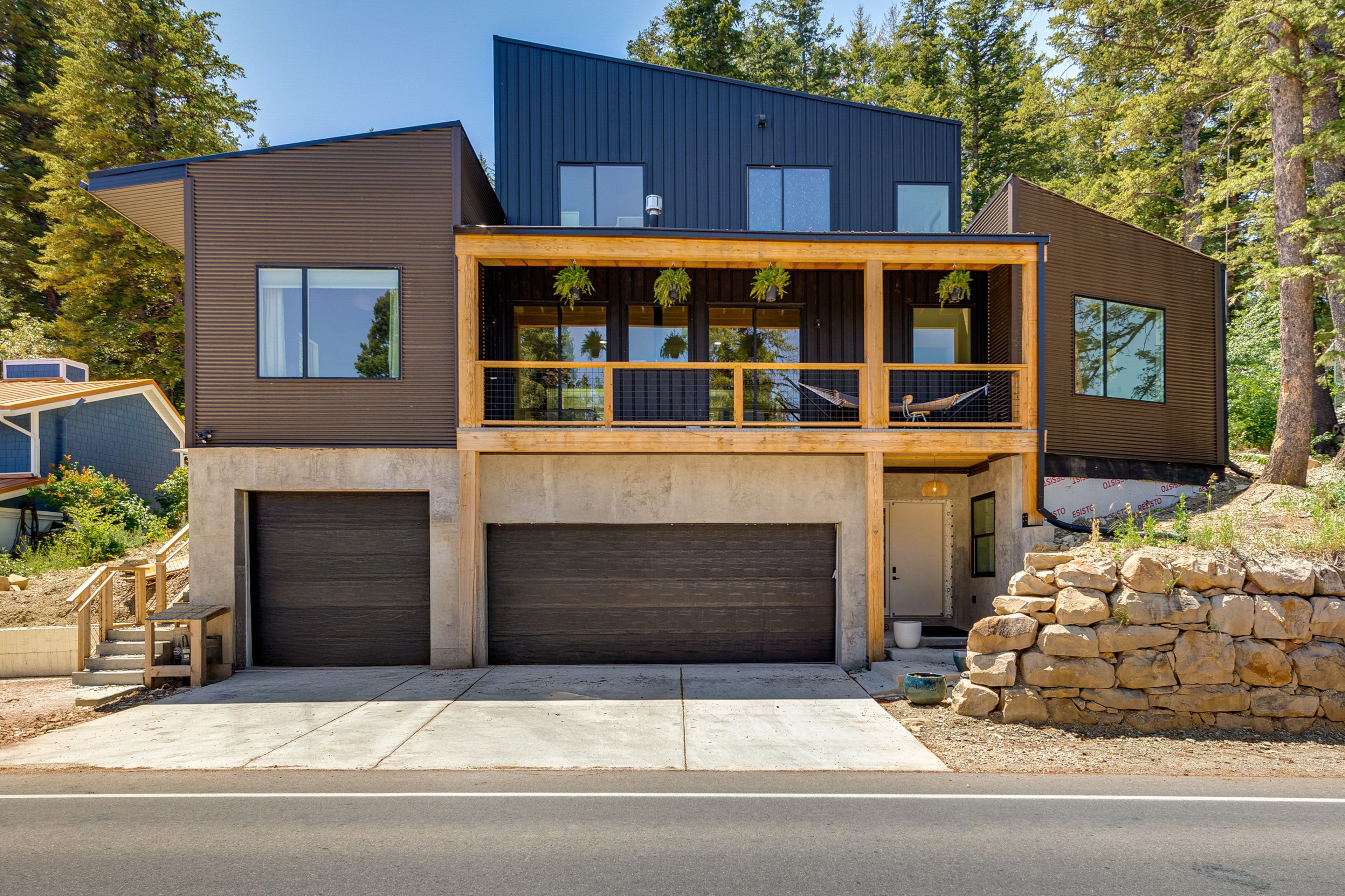 Main Home Exterior | 2-Story Studio (Left Unit Above Garage)