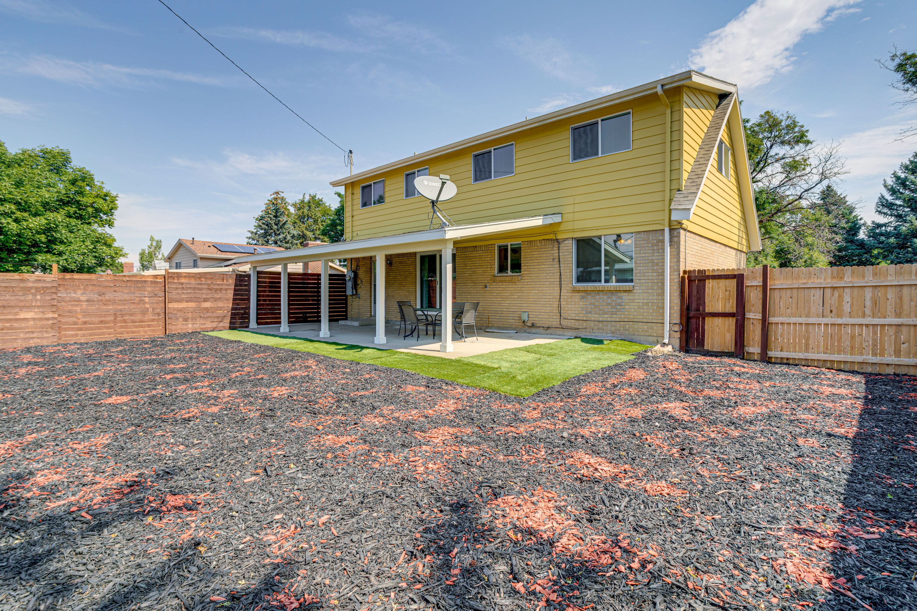 Property Exterior | Covered Patio | Fenced-In Yard