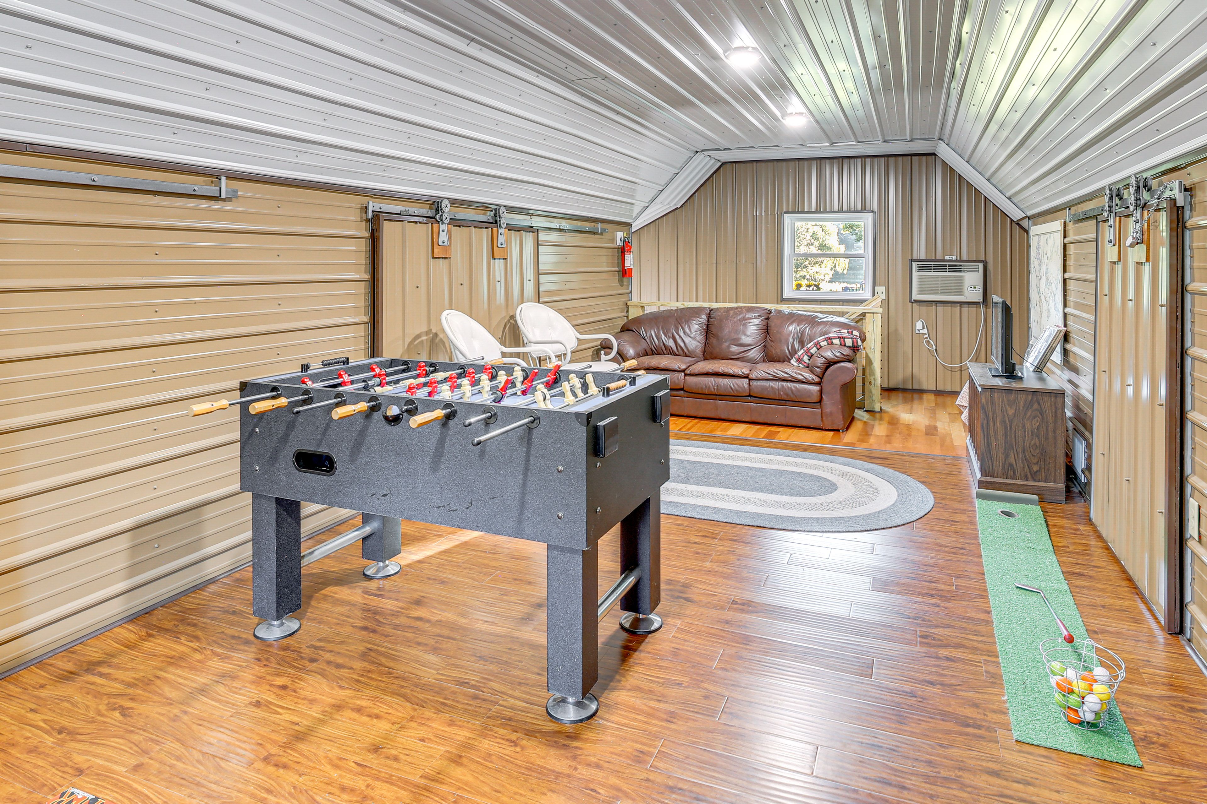 Garage Game Room | Stairs to Access | Foosball Table | Window A/C Unit