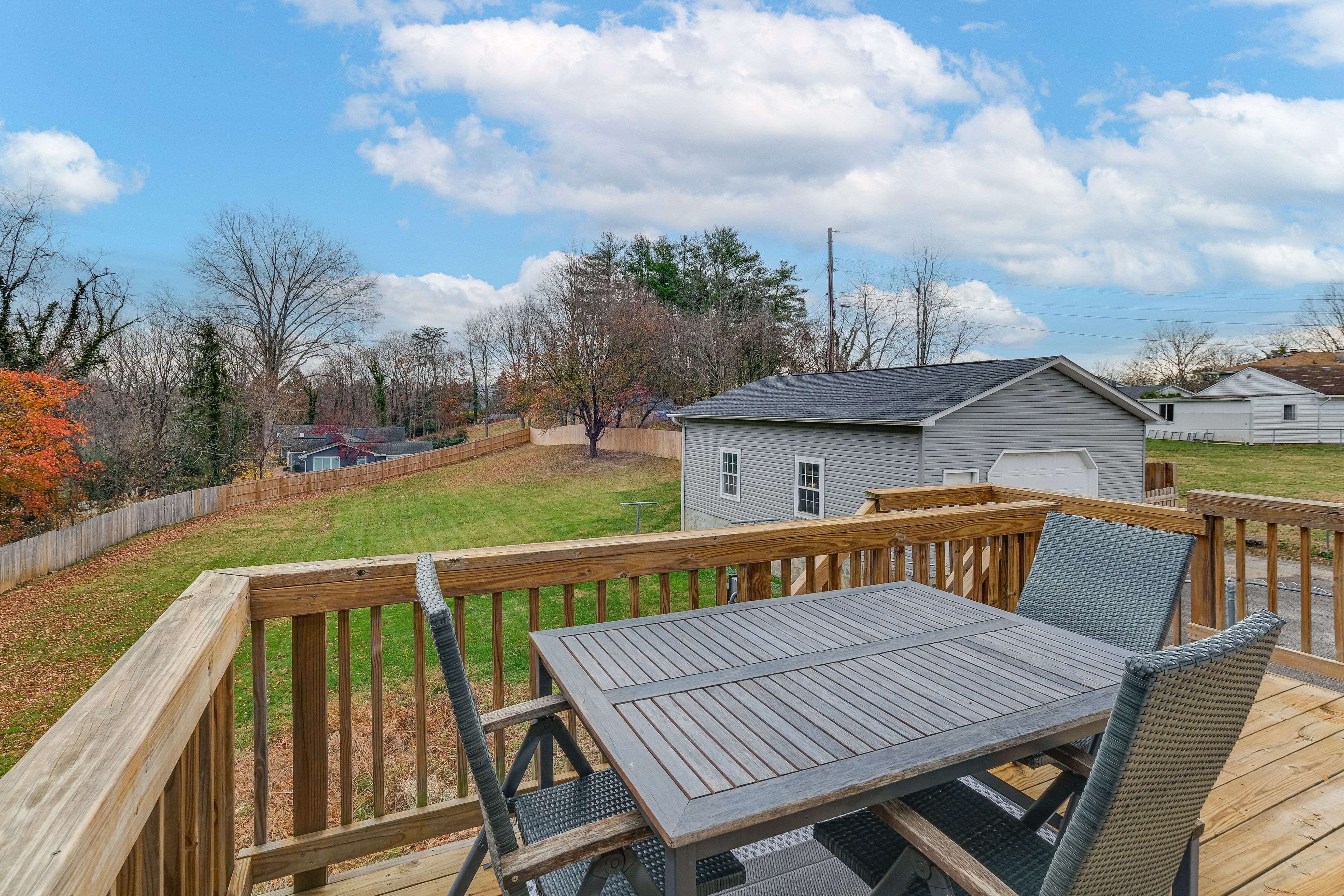 House Exterior | Deck w/ Dining Area | Fenced Backyard