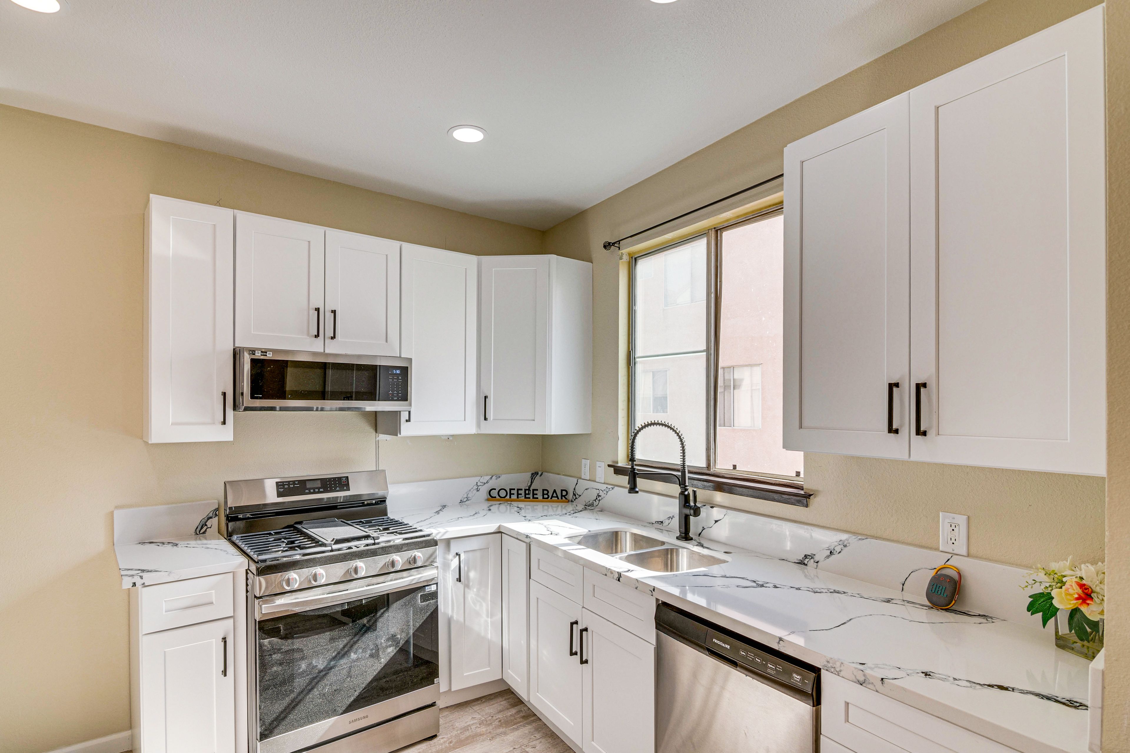 Kitchen | In-Unit Laundry | Free WiFi