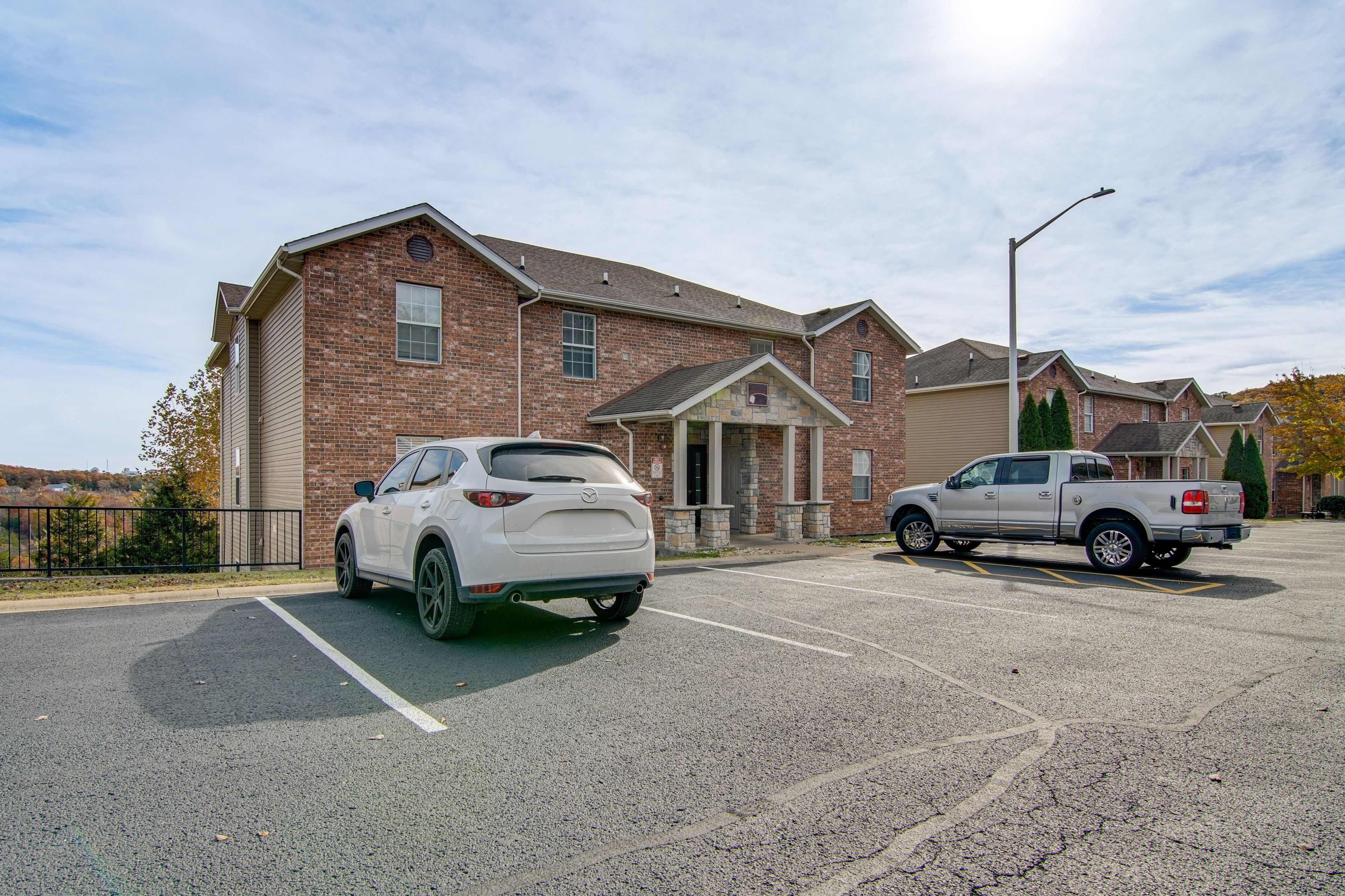 Parking | Community Parking Lot (2 Vehicles, First-Come, First-Served)