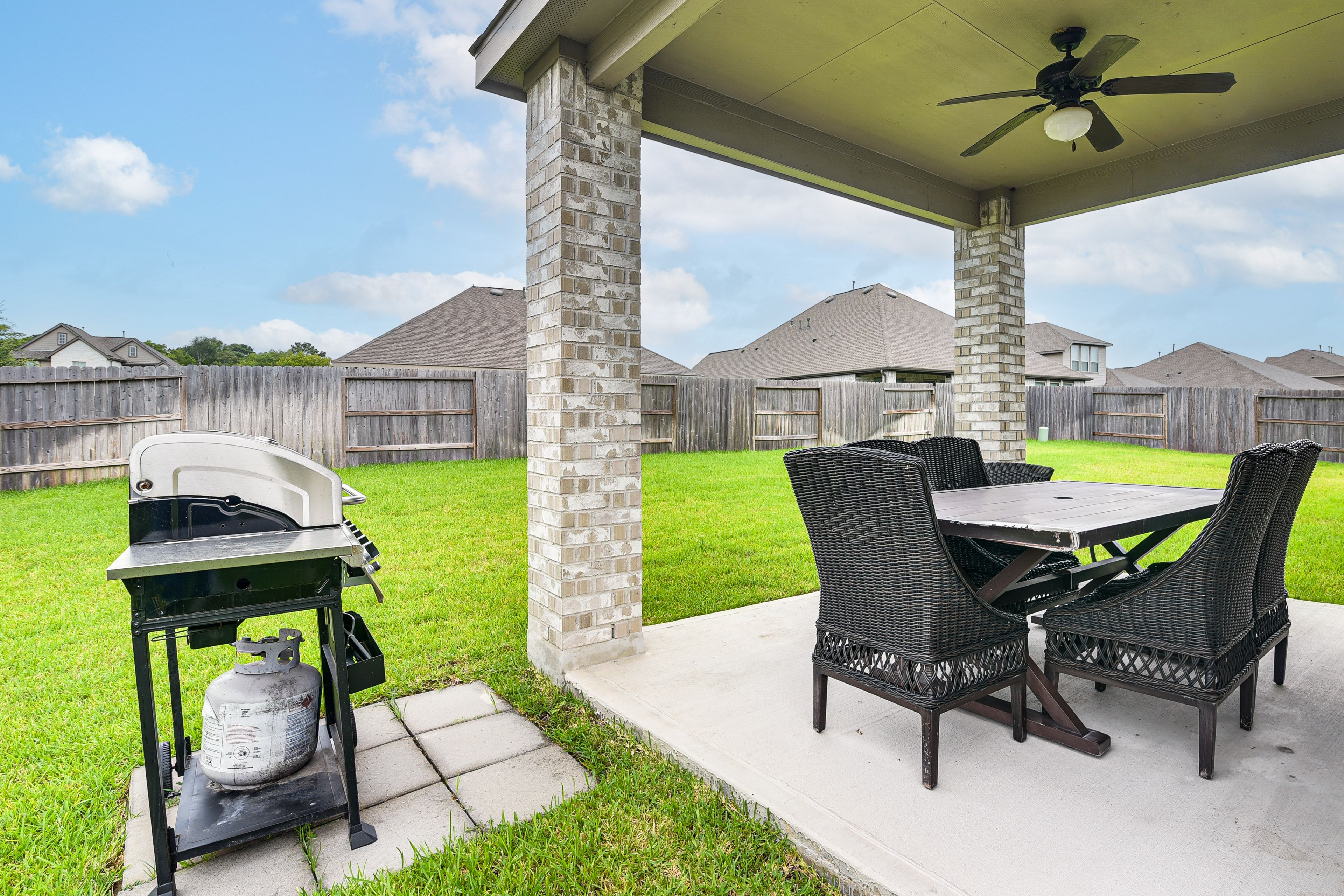 Covered Patio | Dining Area | Gas Grill | Fenced Backyard
