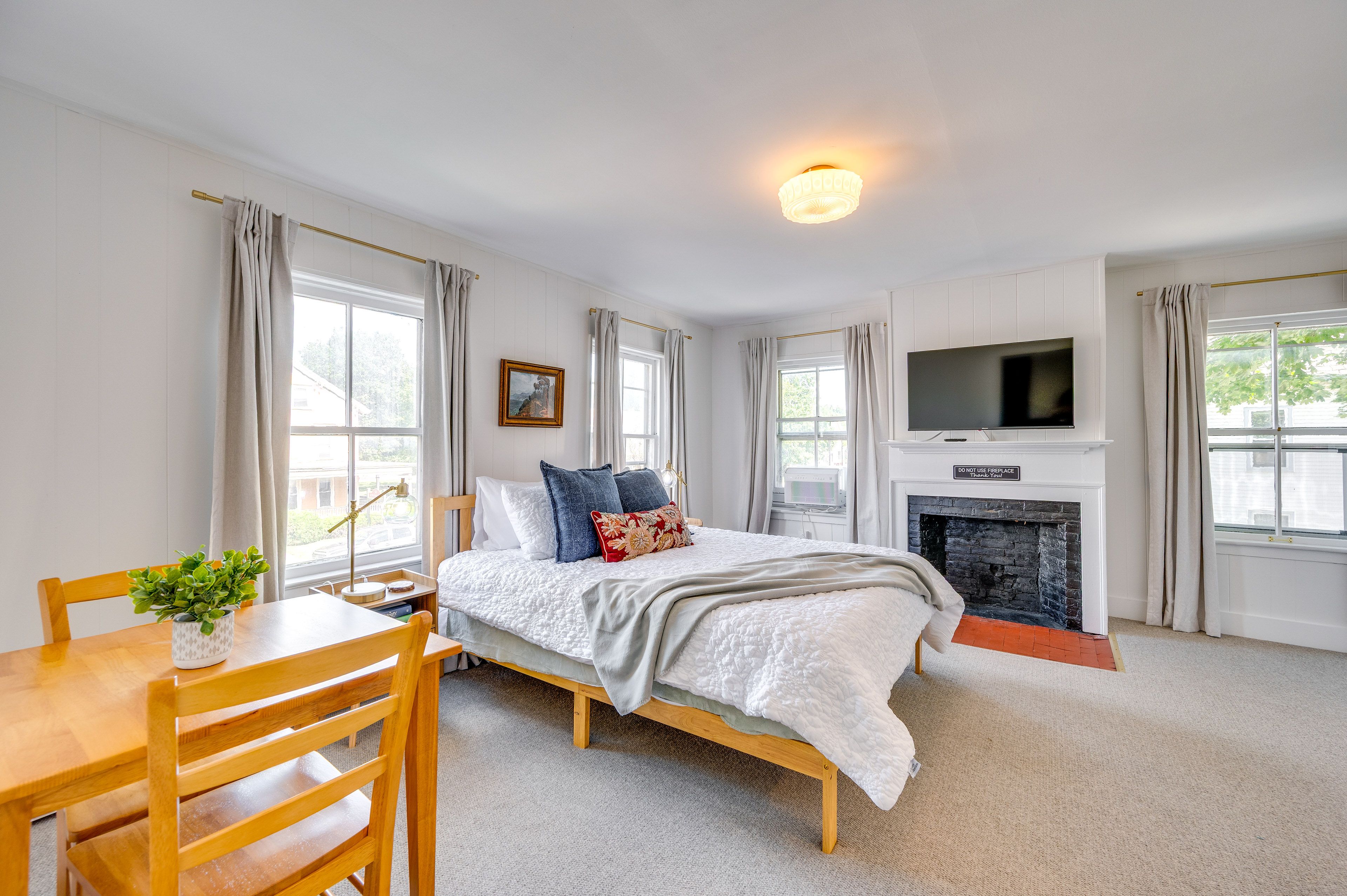 Studio Interior | Queen Bed | Smart TV | Window A/C Unit