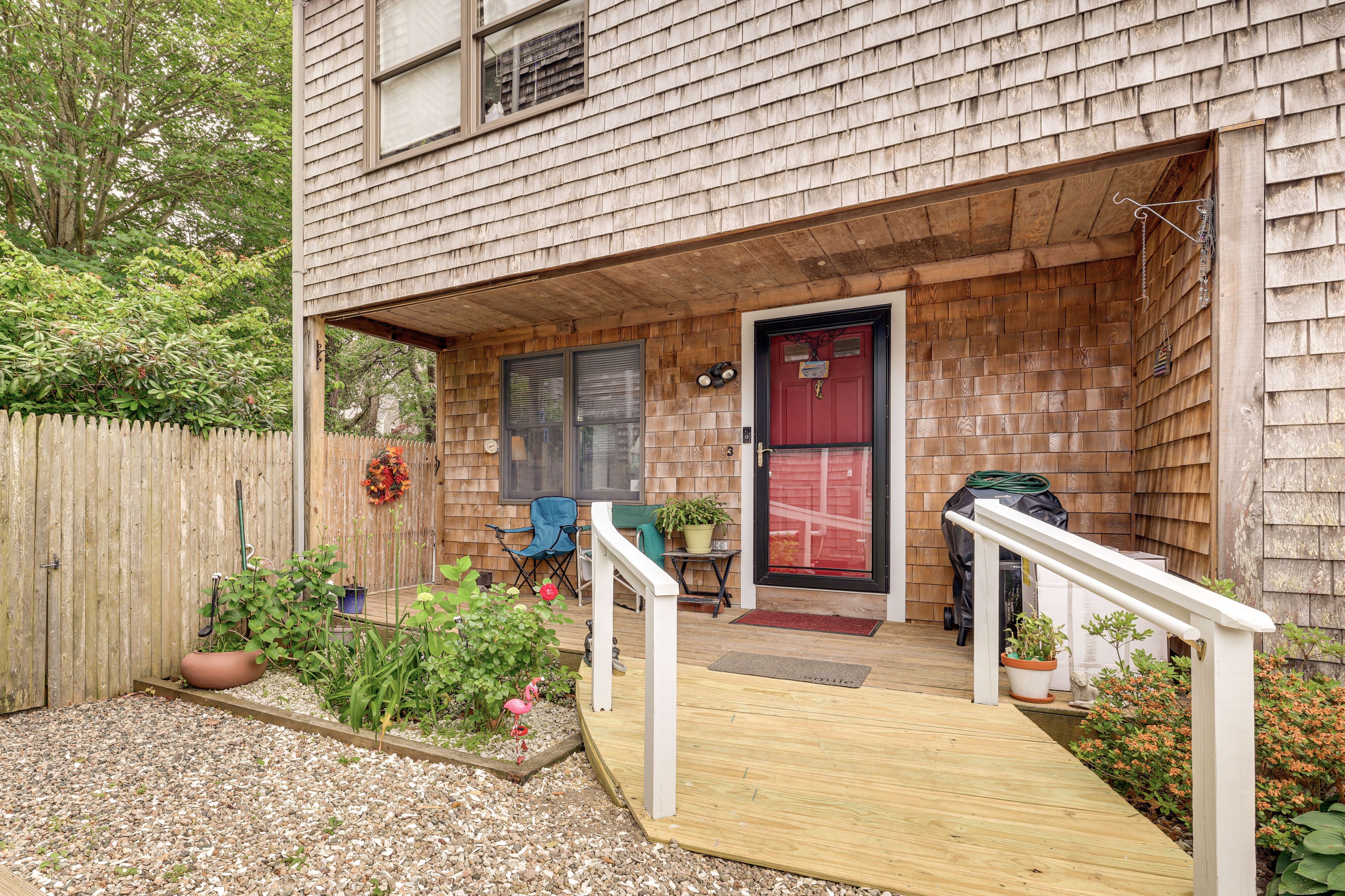 Property Exterior | Covered Porch | 4-Story Condo