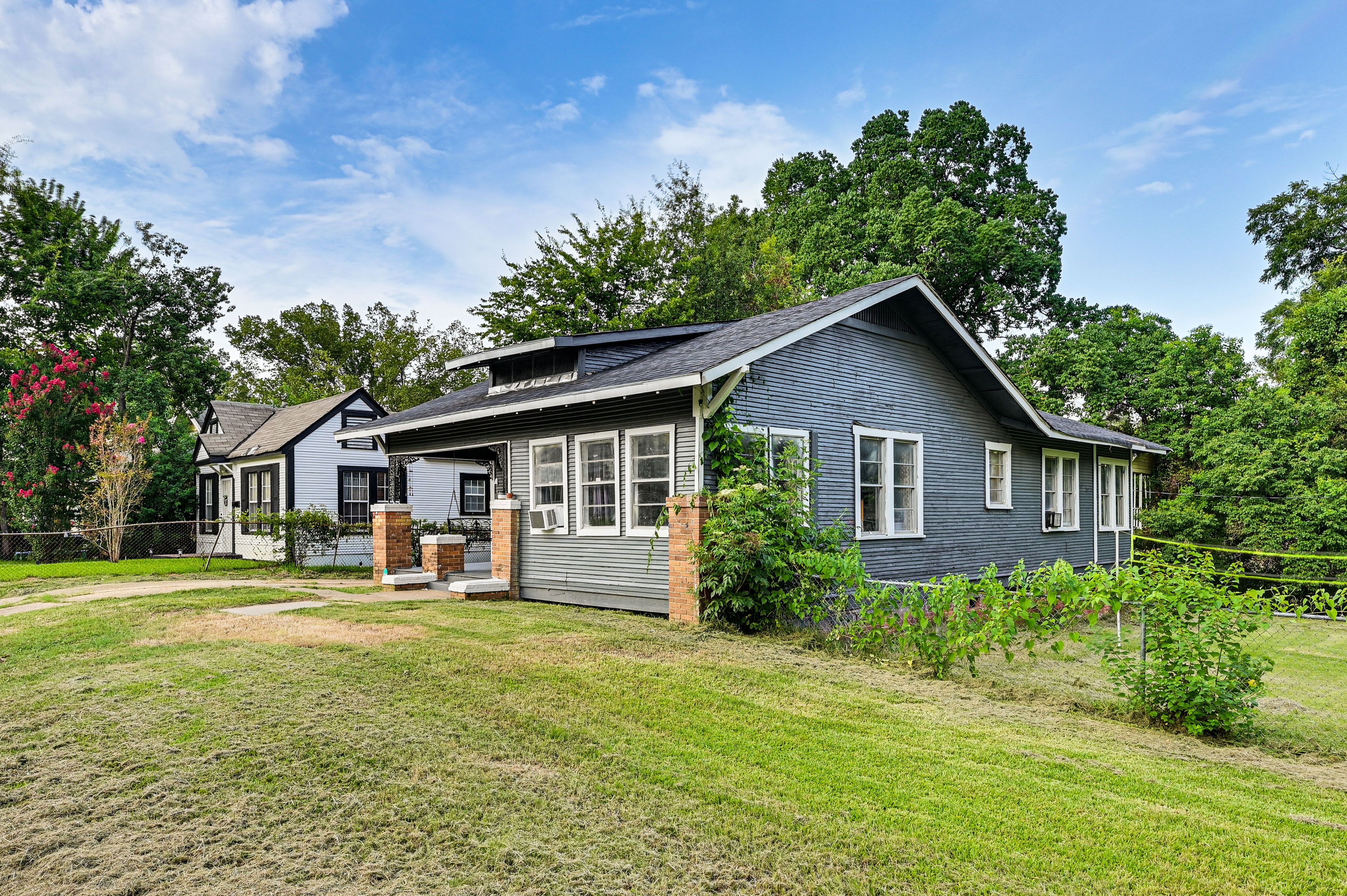 Exterior | Single-Story House | Fenced-In Yard w/ Volleyball Net