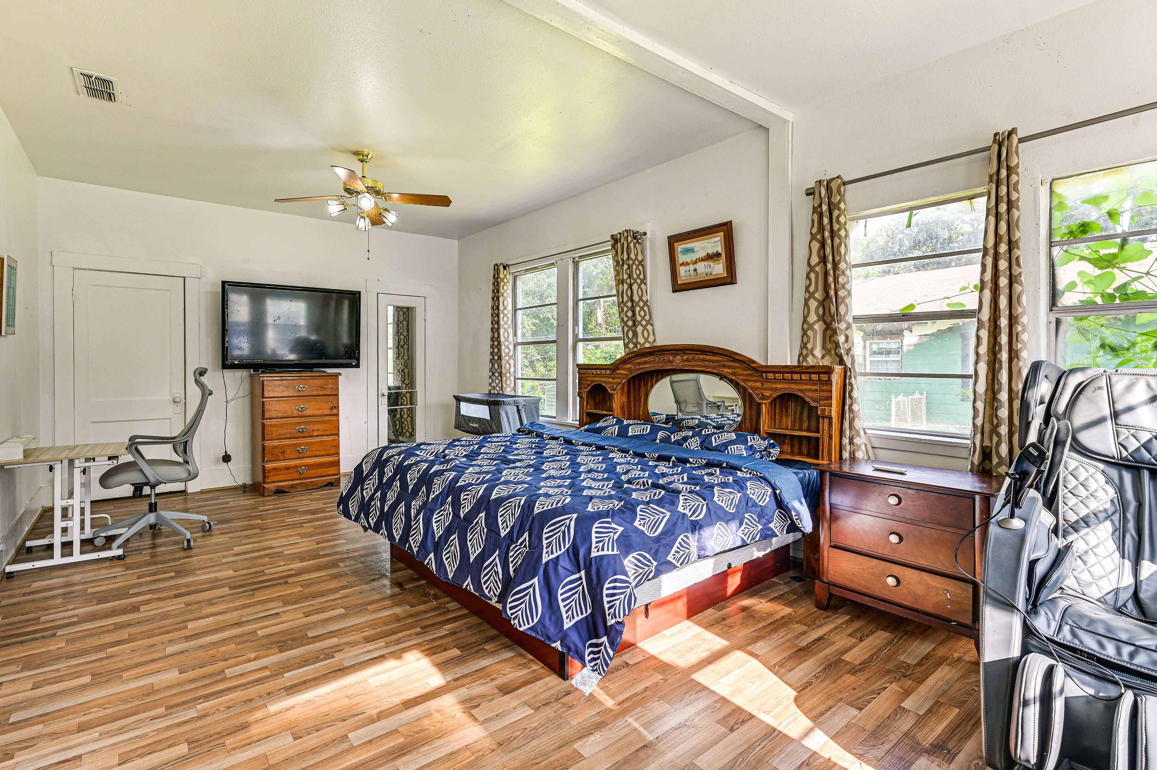 Bedroom 1 | King Bed | Crib | Dedicated Workspace | Smart TV | Linens Provided