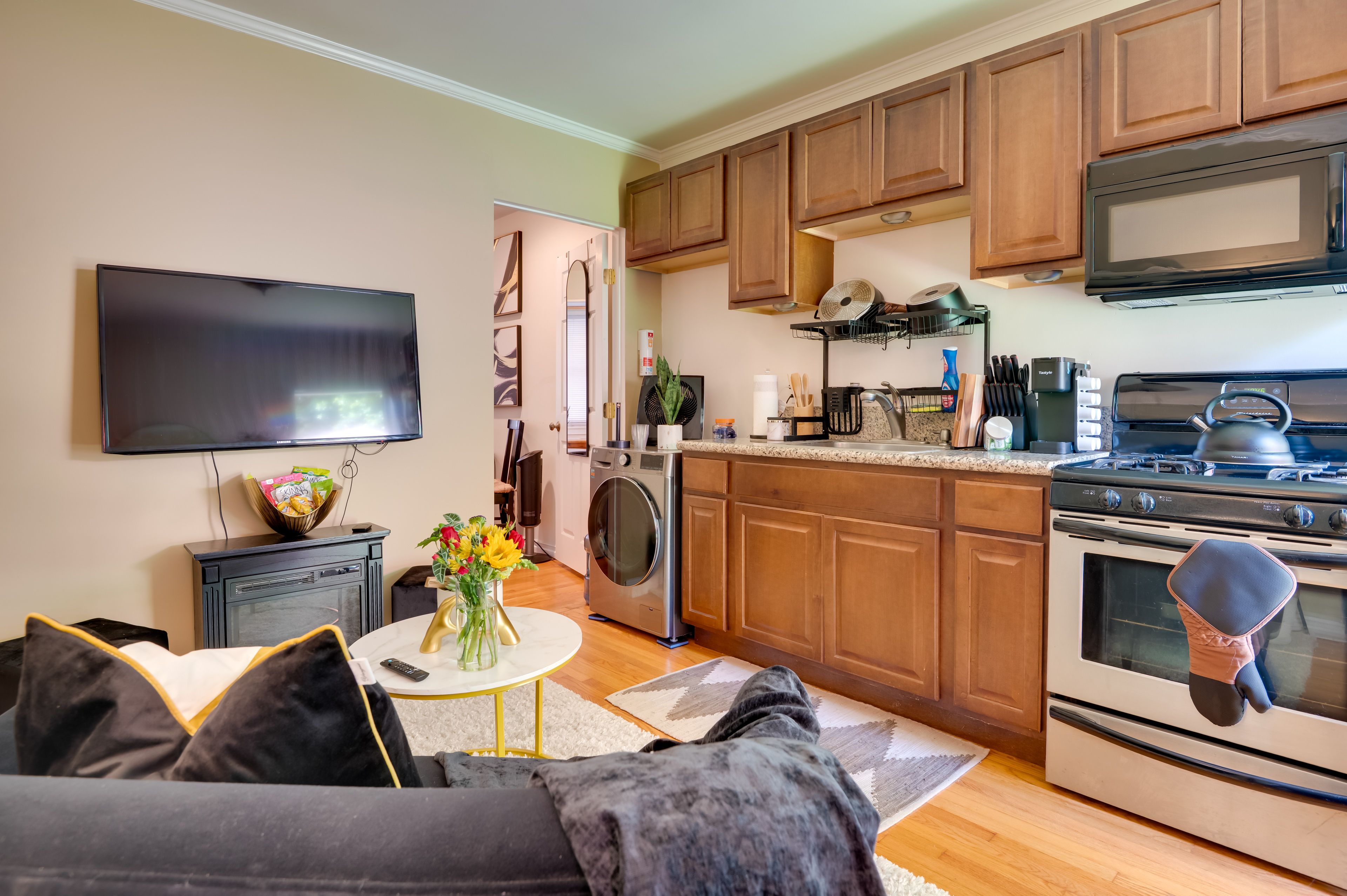 Living Room | Window A/C Unit | Portable Heaters | Single-Story Home