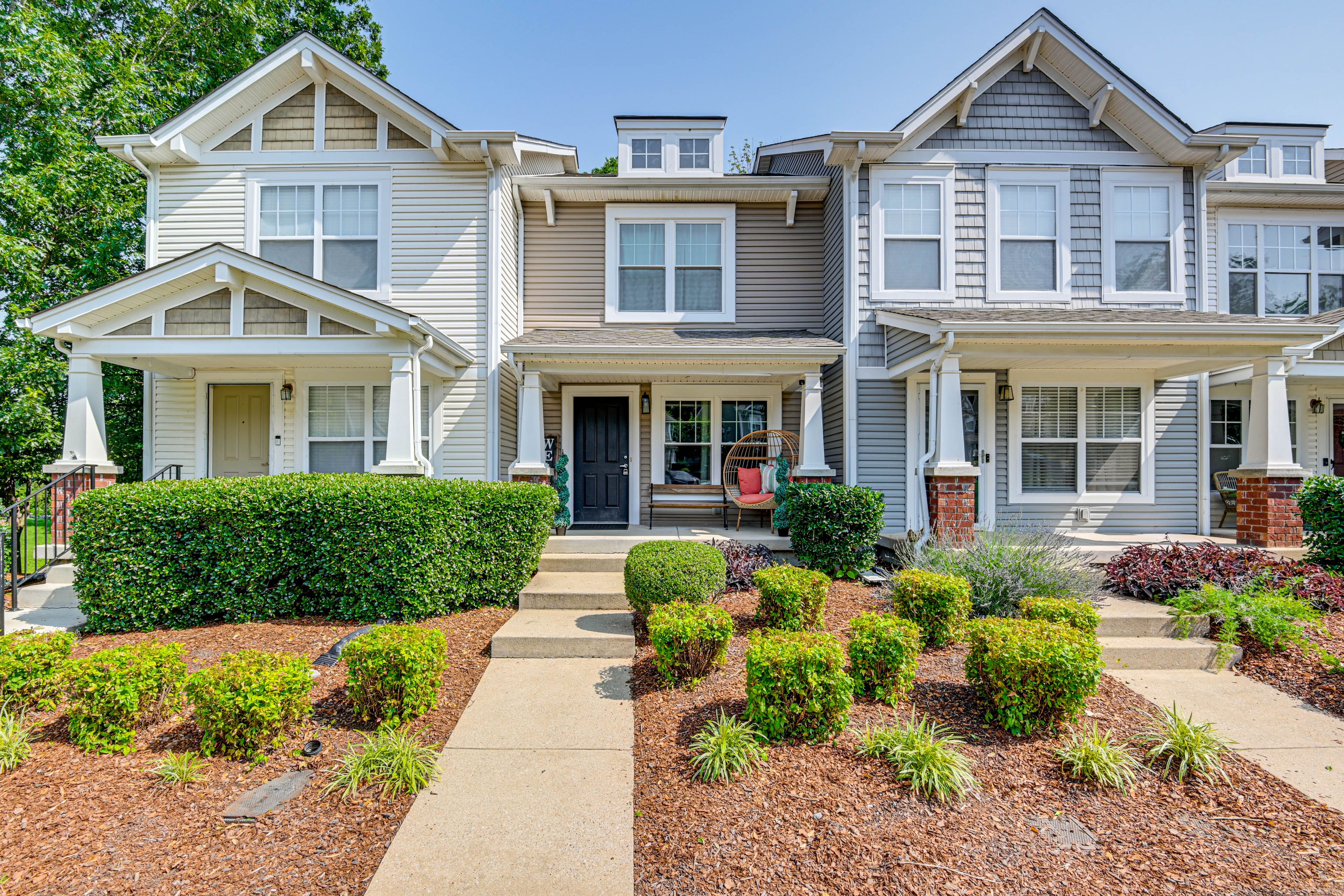 Property Exterior | Covered Porch w/ Seating | Dining Table | Shared Yard