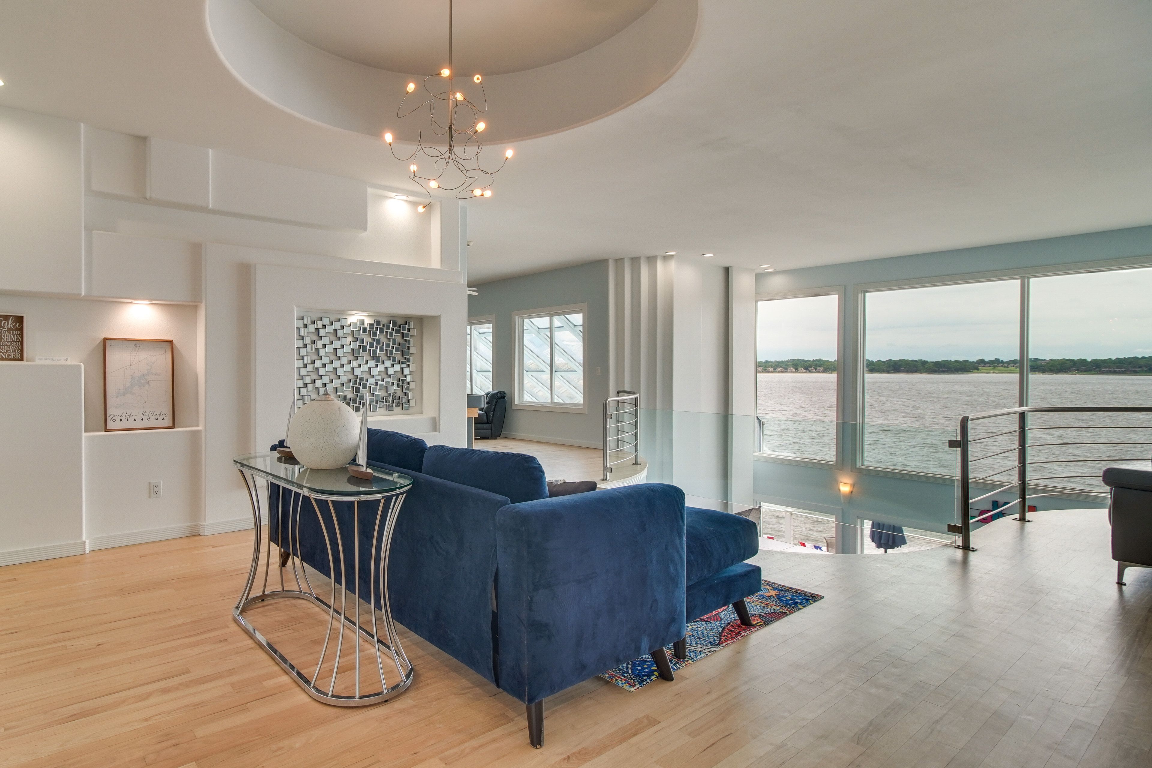 Upstairs Living Room | Lake Views | Open Interior | 3-Story Home