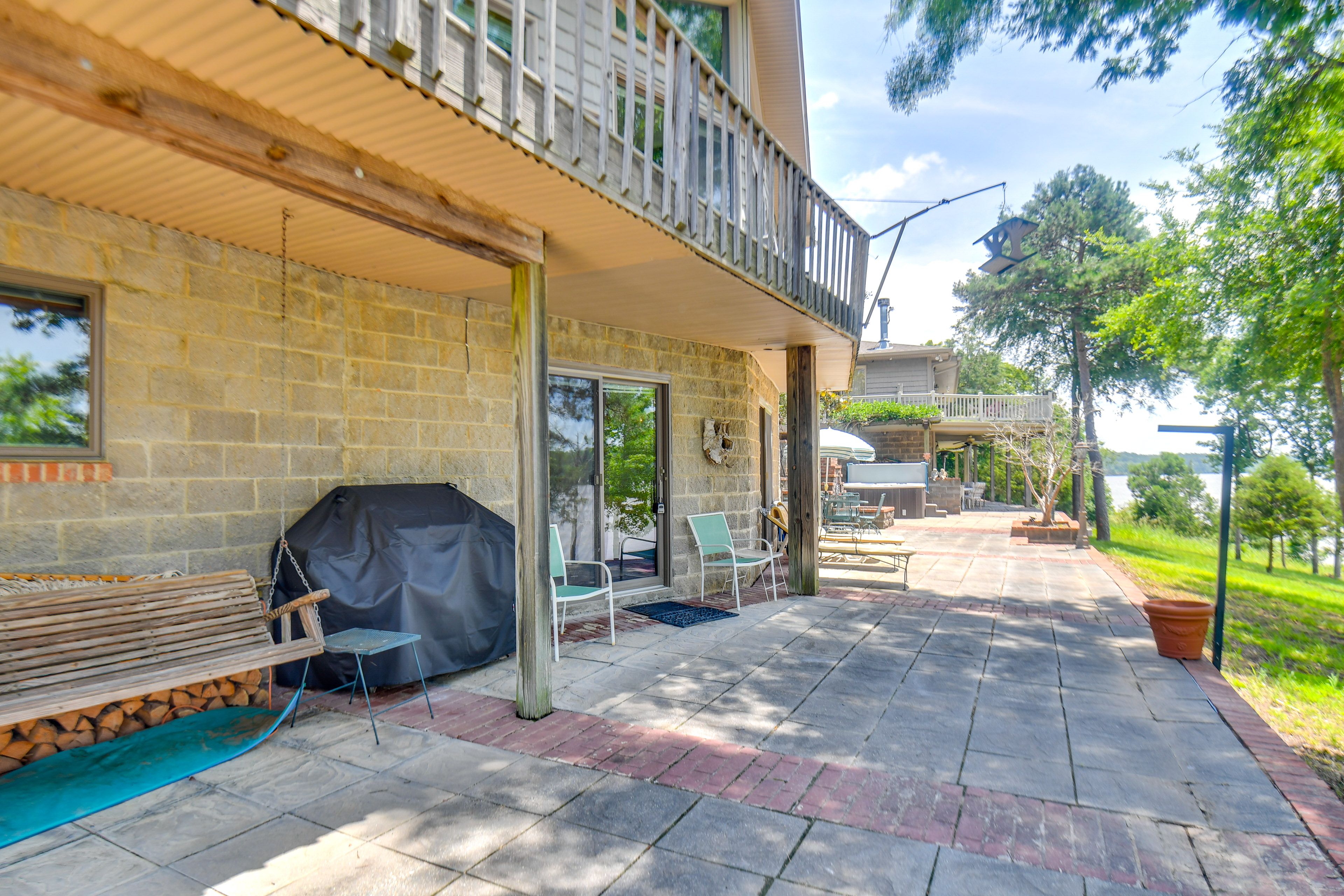 Private Patio | Access via Basement | Hot Tub | Scenic Lake Views