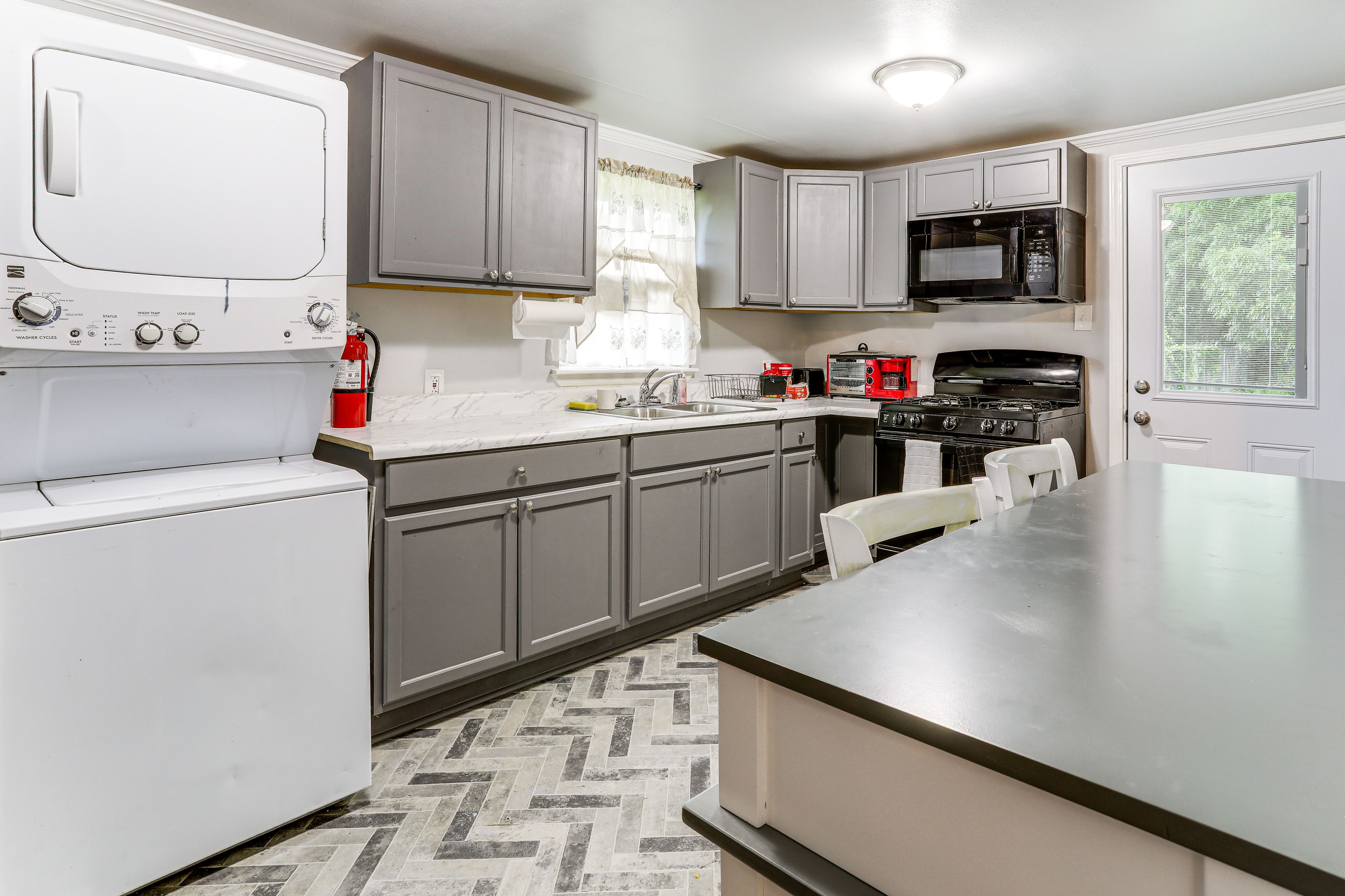 Kitchen | In-Unit Laundry | Central Heating & A/C