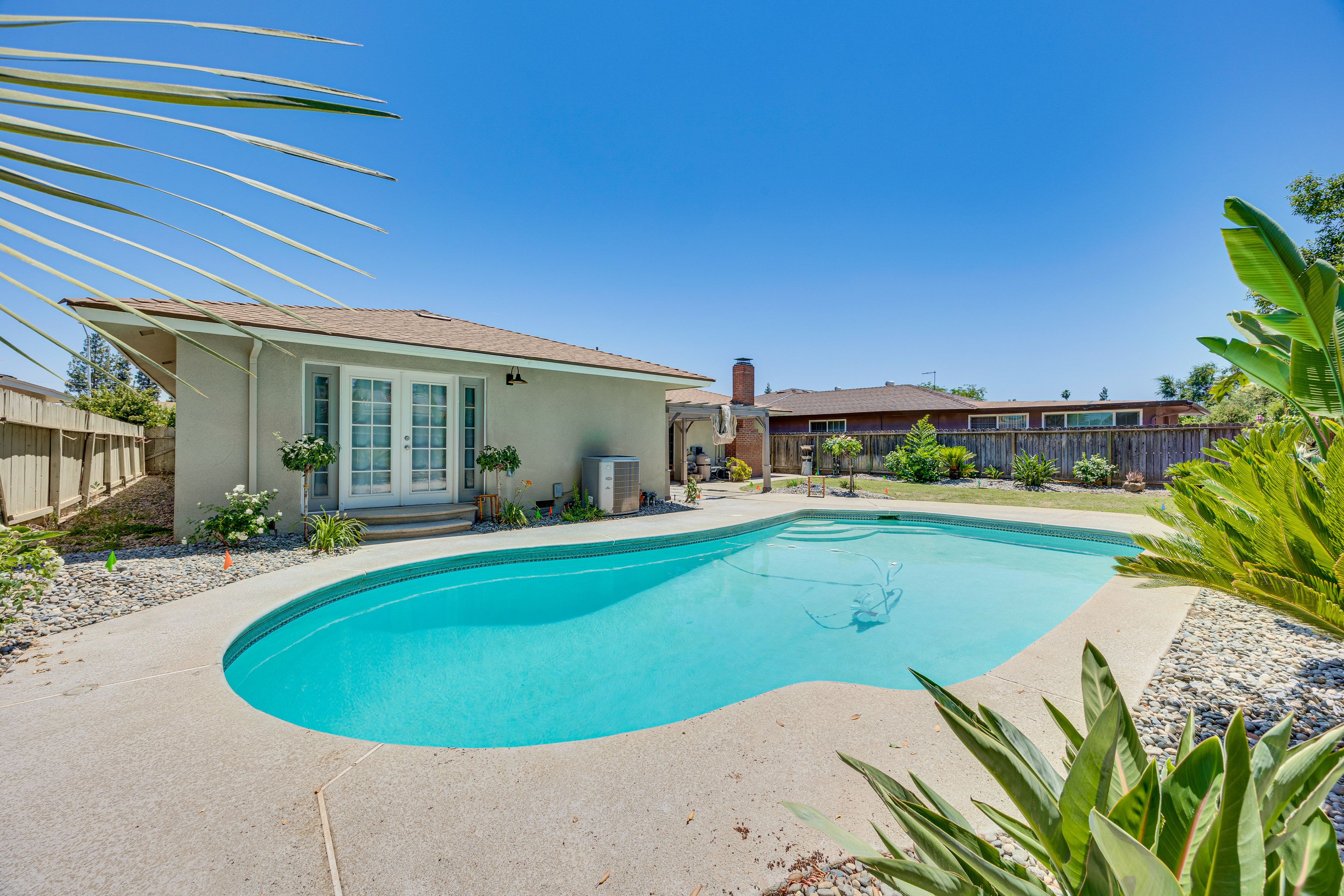 Fresno Vacation Rental | 3BR | 2BA | 2 Steps to Enter | 1,904 Sq Ft