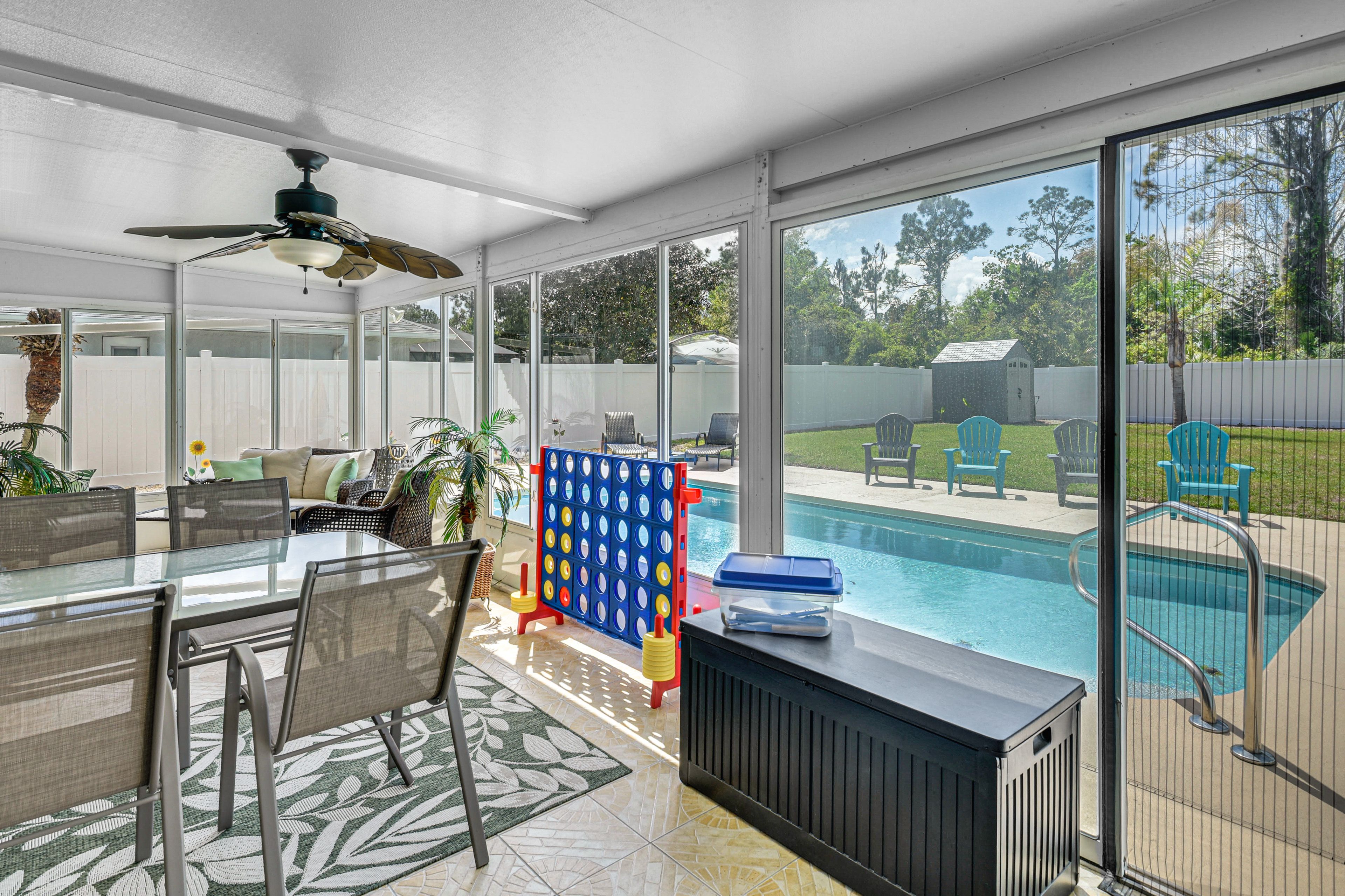 Glass Screened Patio | Cornhole | Dining Set