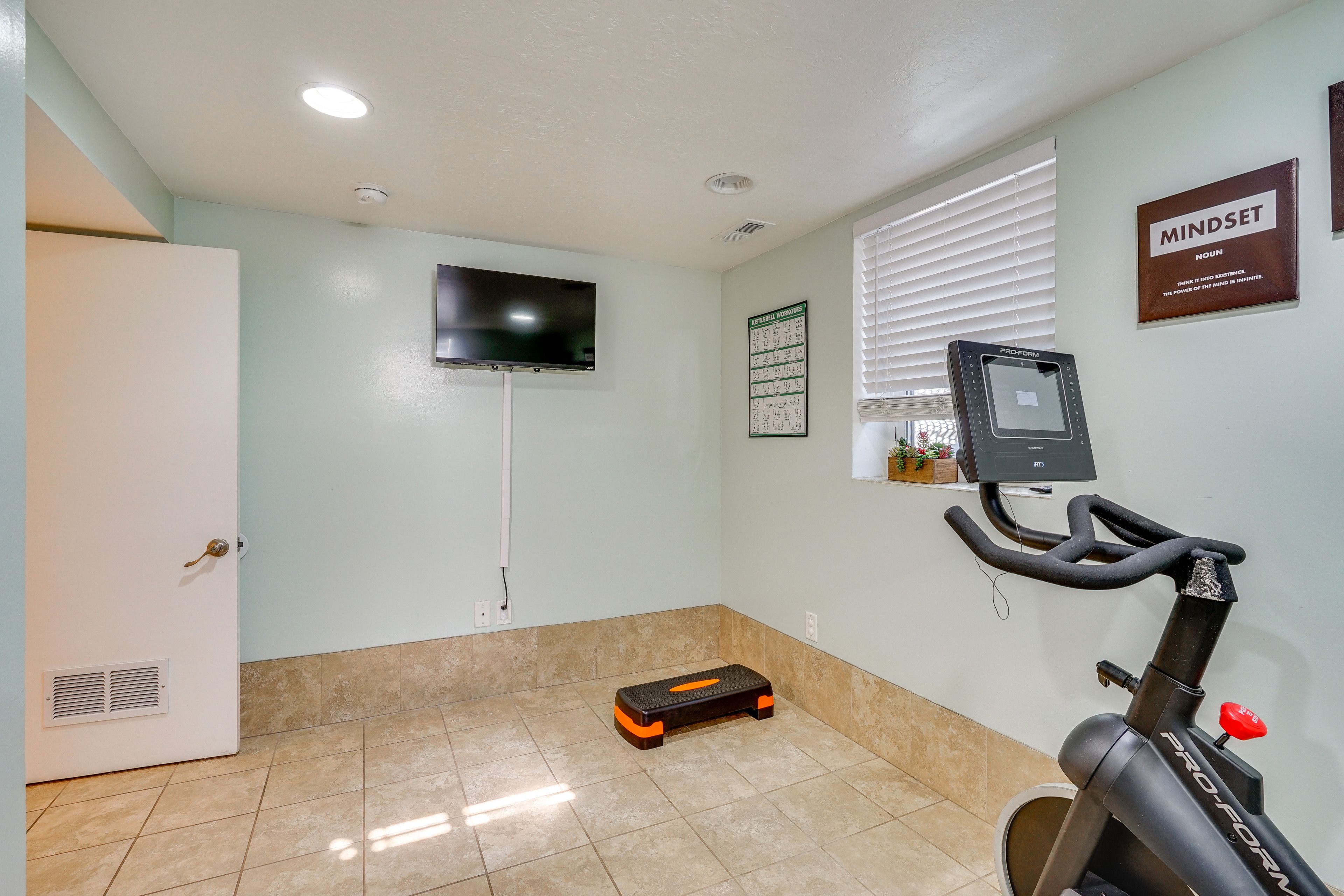 Home Gym | Exercise Bike | Kettlebells | Small Trampoline | Main Level
