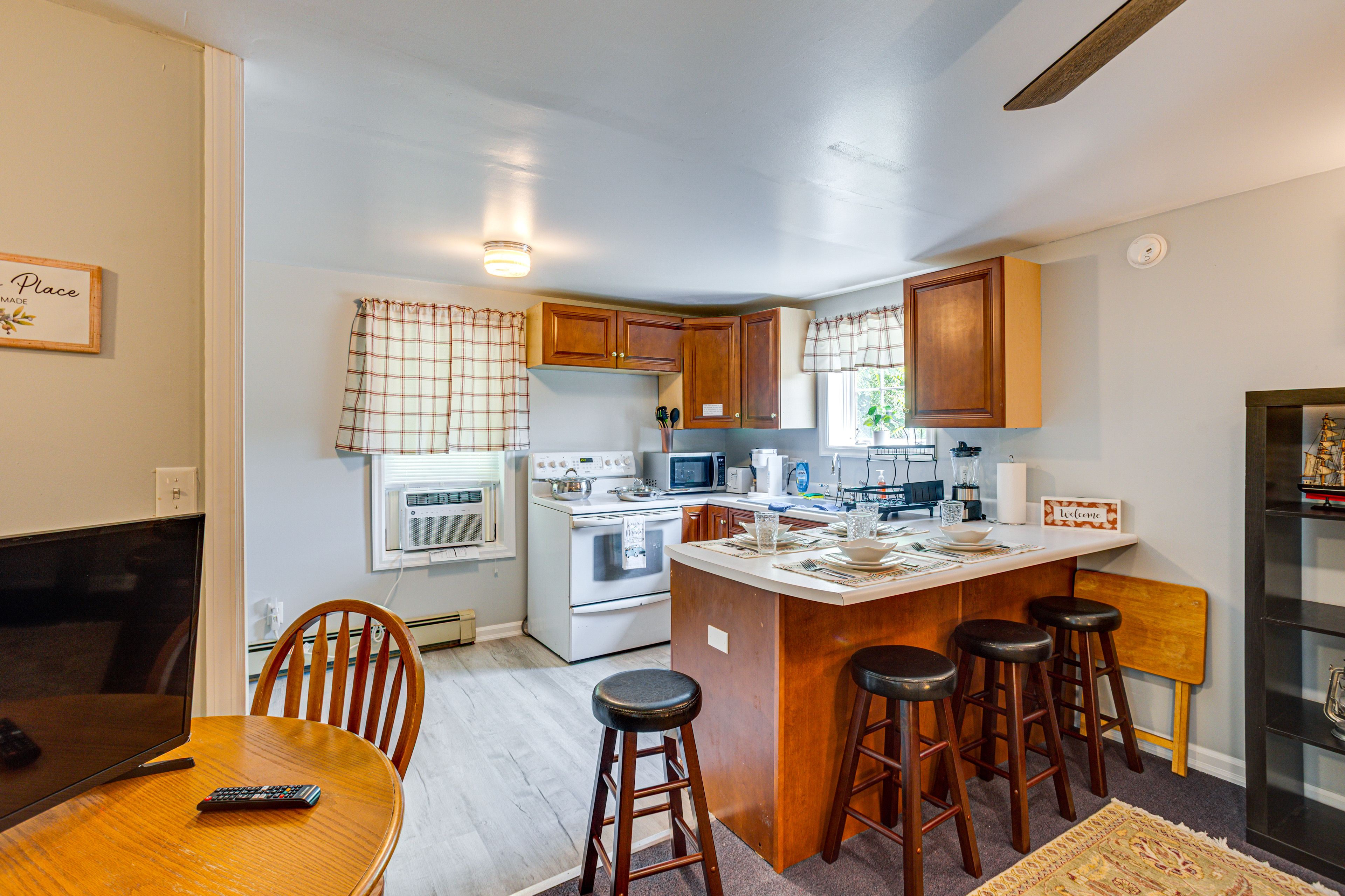 Living Room & Kitchen | Wide Twin Futon | Window A/C Unit | Central Heat