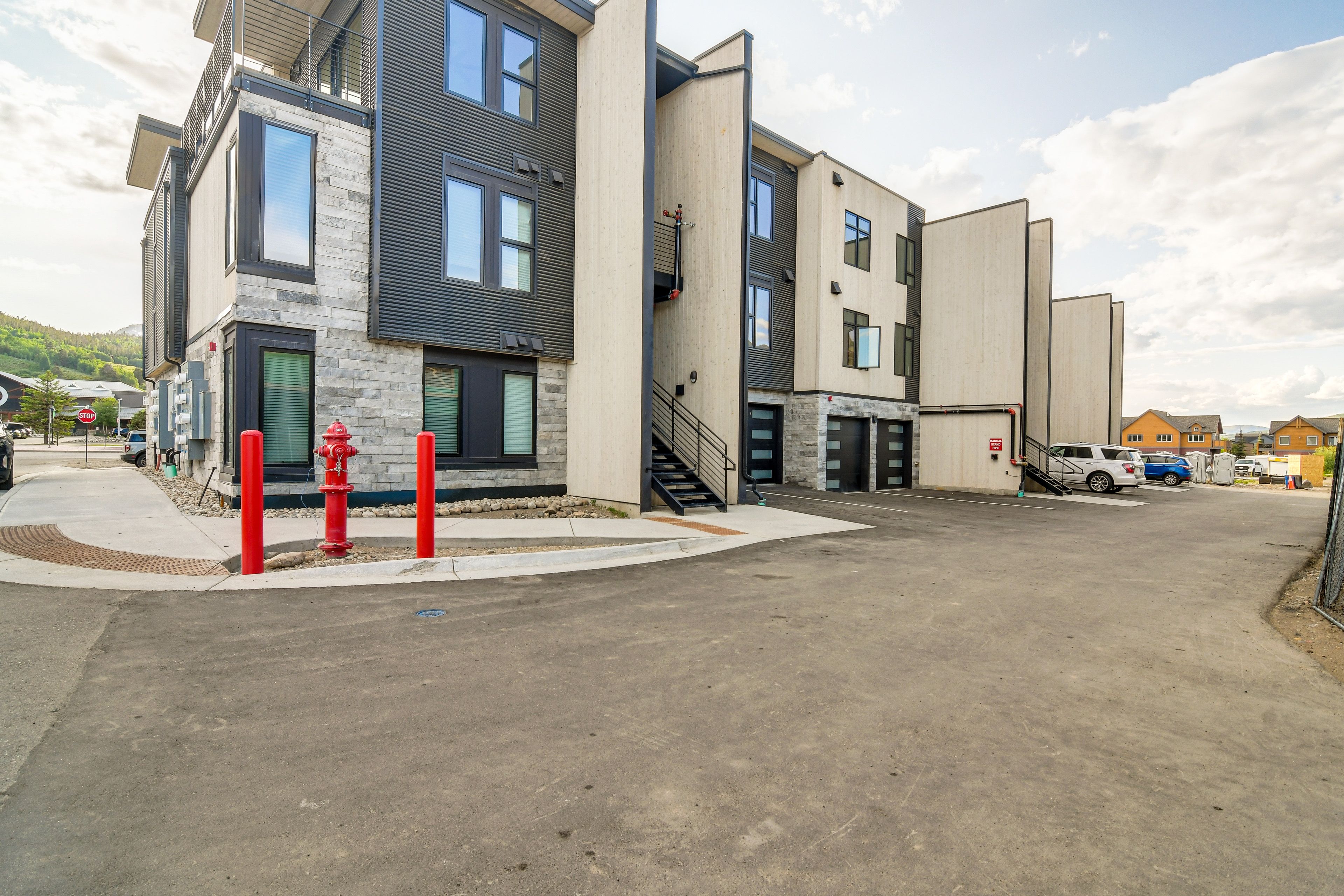 Condo Exterior | Parking | Assigned Parking Spots (2 Vehicles)