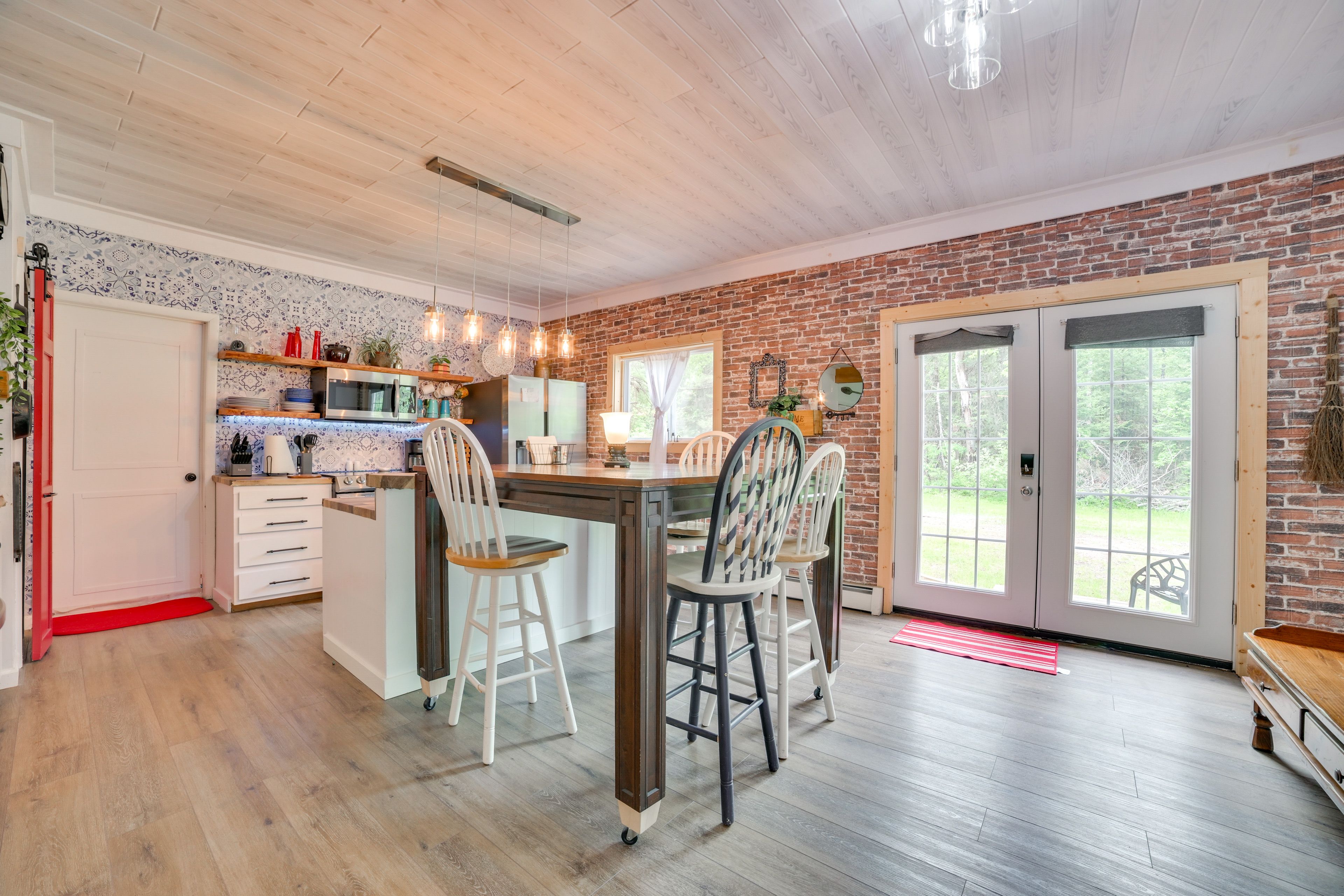 Kitchen & Dining Area | Single-Story Cabin | In-Unit Laundry