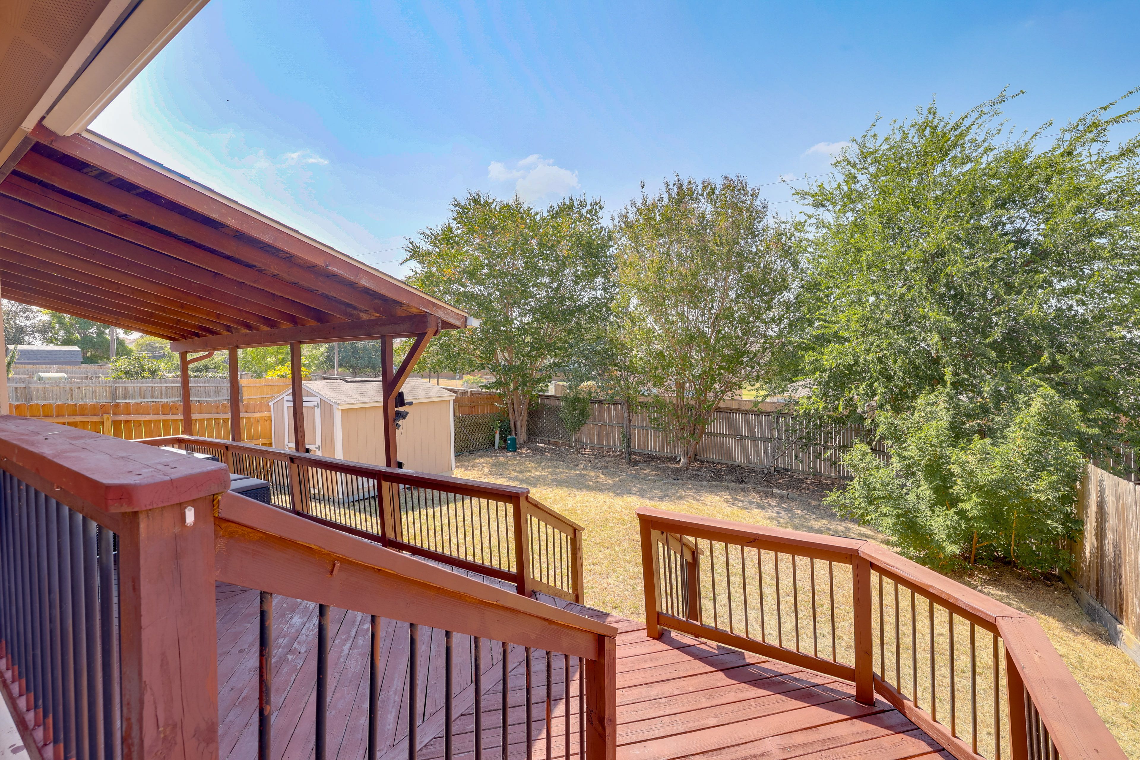 House Exterior | Covered Deck w/ Dining Area