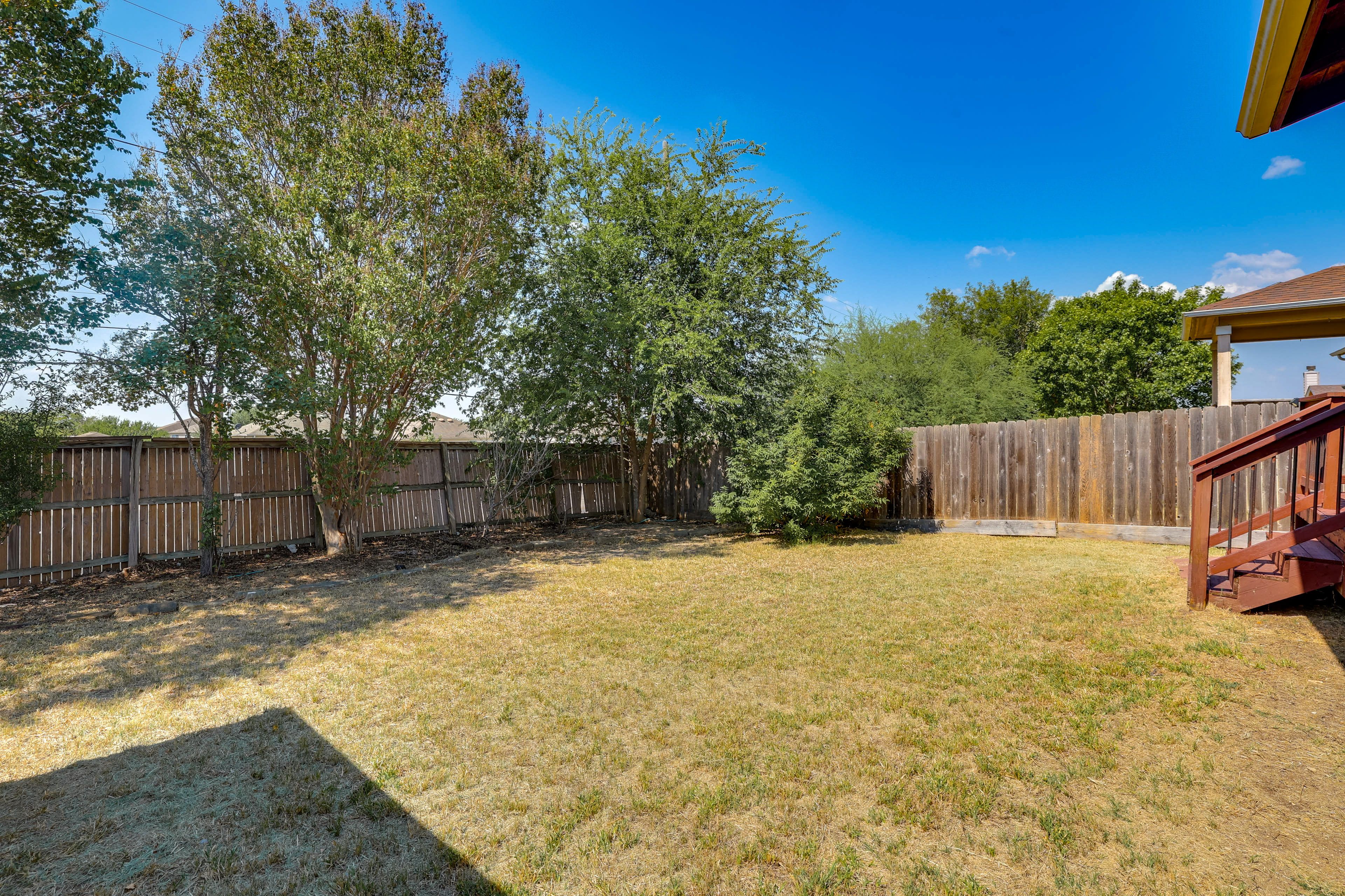 House Exterior | Fenced Backyard