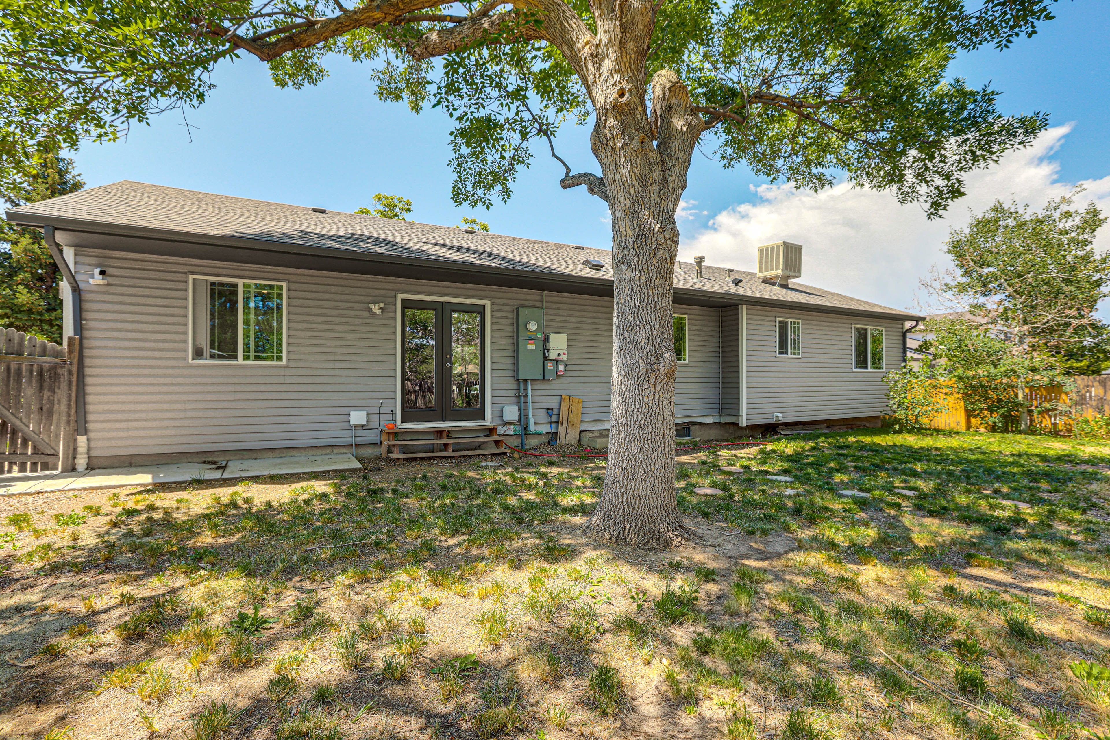 Property Exterior | Fenced-In Yard | Wood-Burning Fire Pit