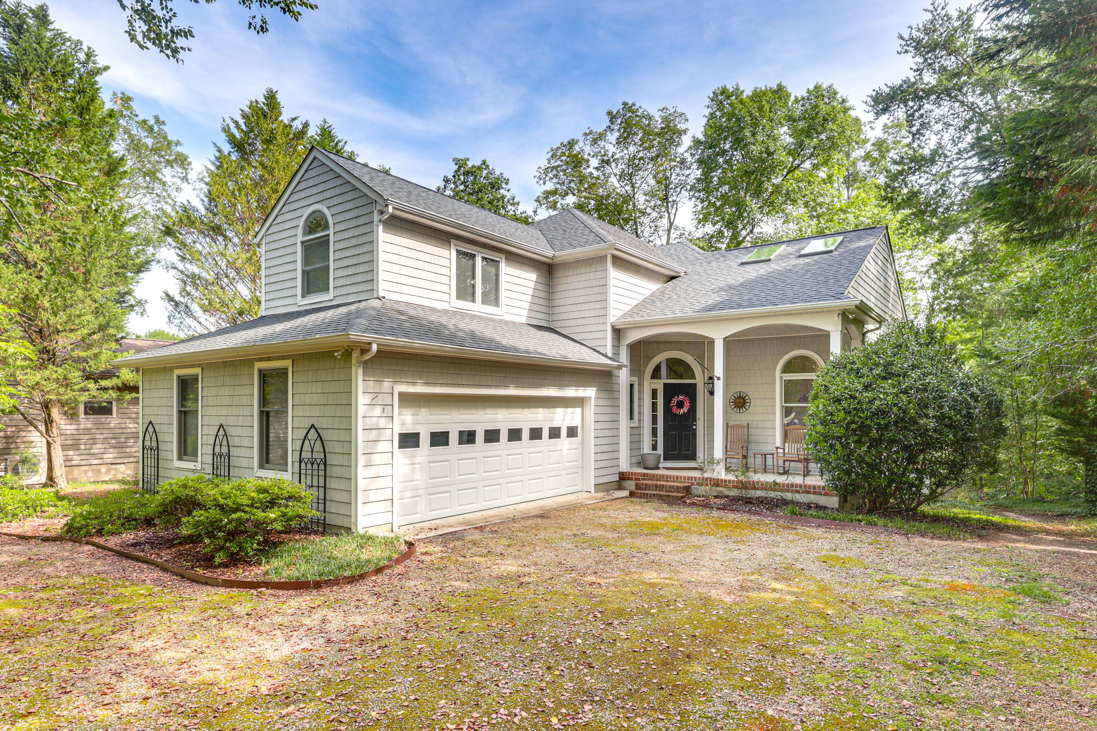 Property Exterior | Private Yard | Screened-In Porch | Boat Dock | Water Access