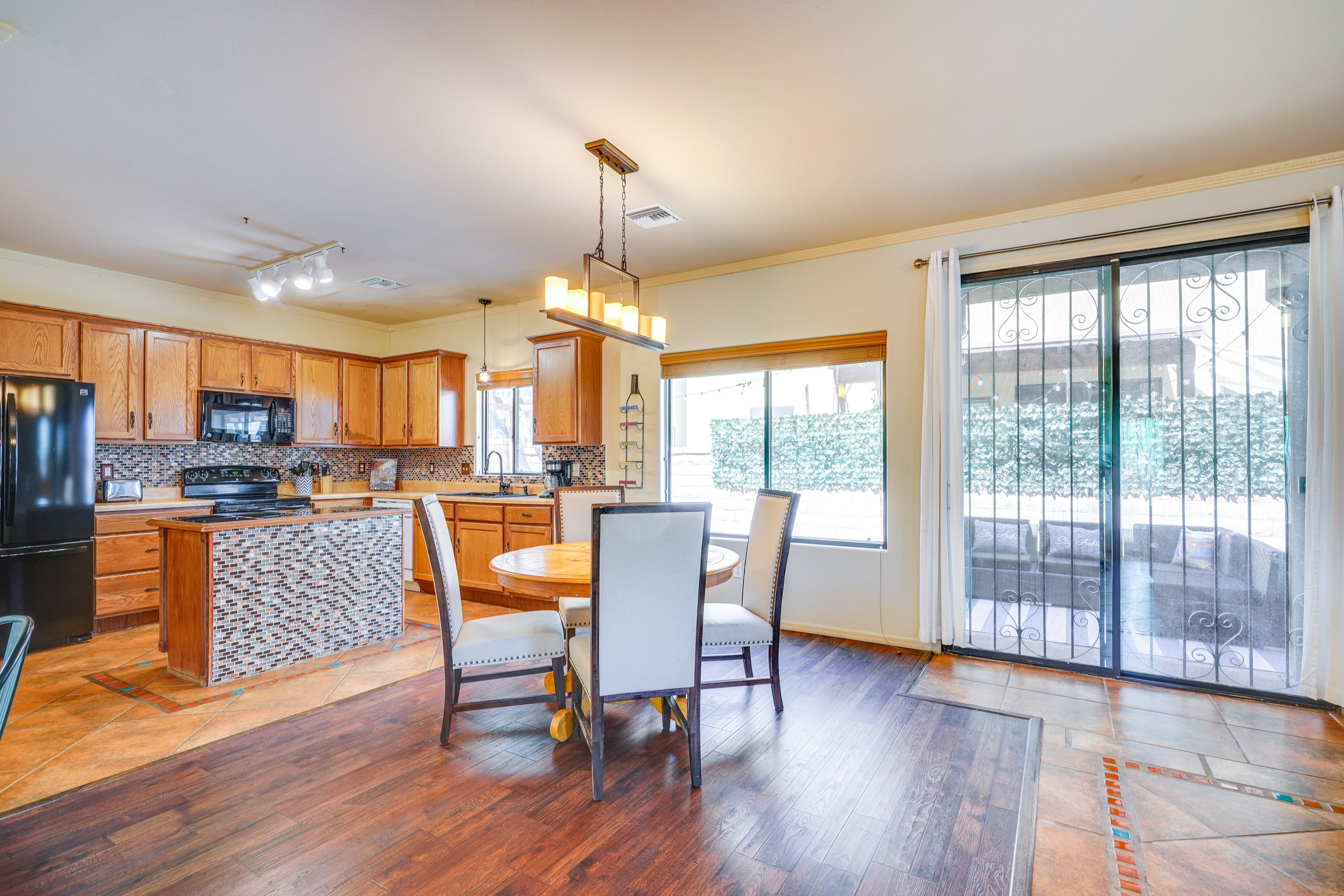 Dining Area | Dishware & Flatware | Central A/C & Heat | 1st Floor