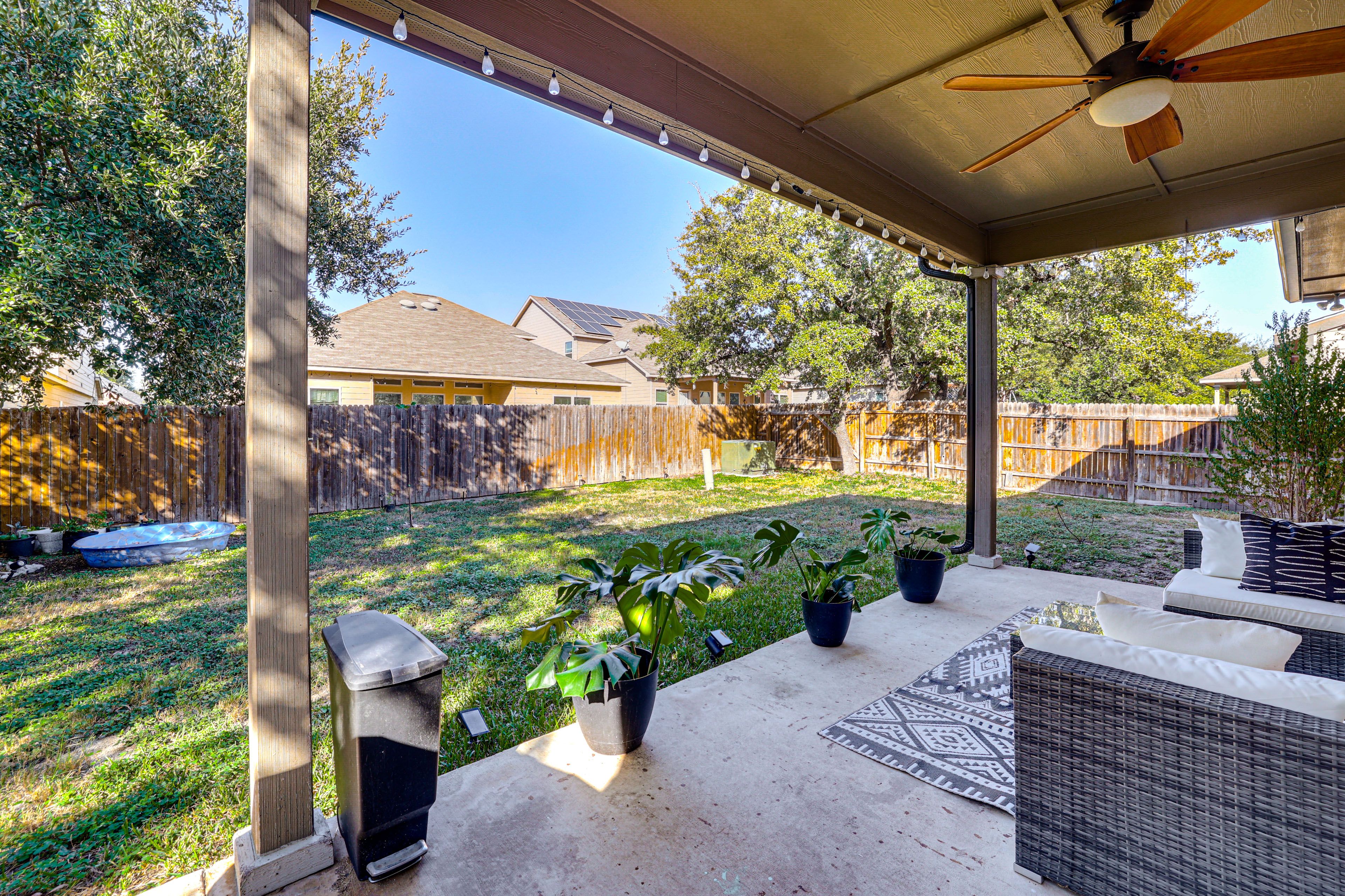 House Exterior | Covered Patio w/ Seating | Fenced Backyard