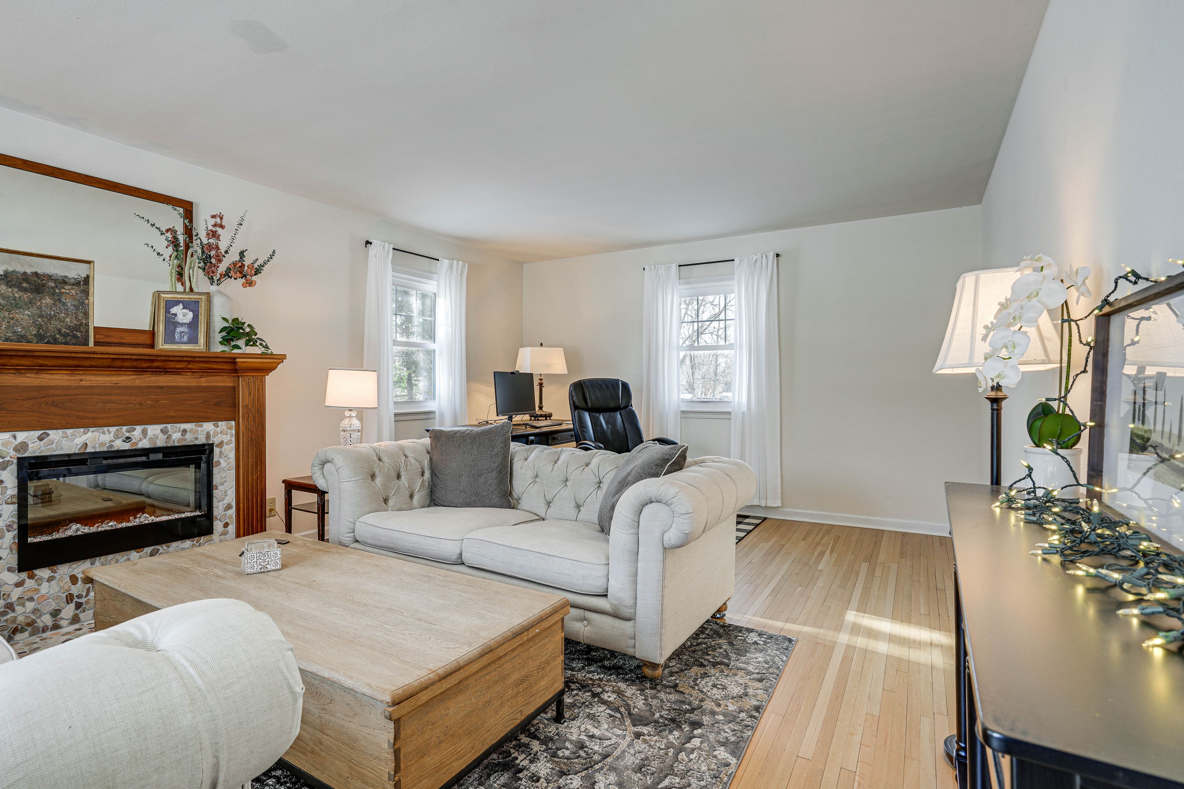 Living Area | Electric Fireplace | Dedicated Workspace | Free WiFi | 1st Floor