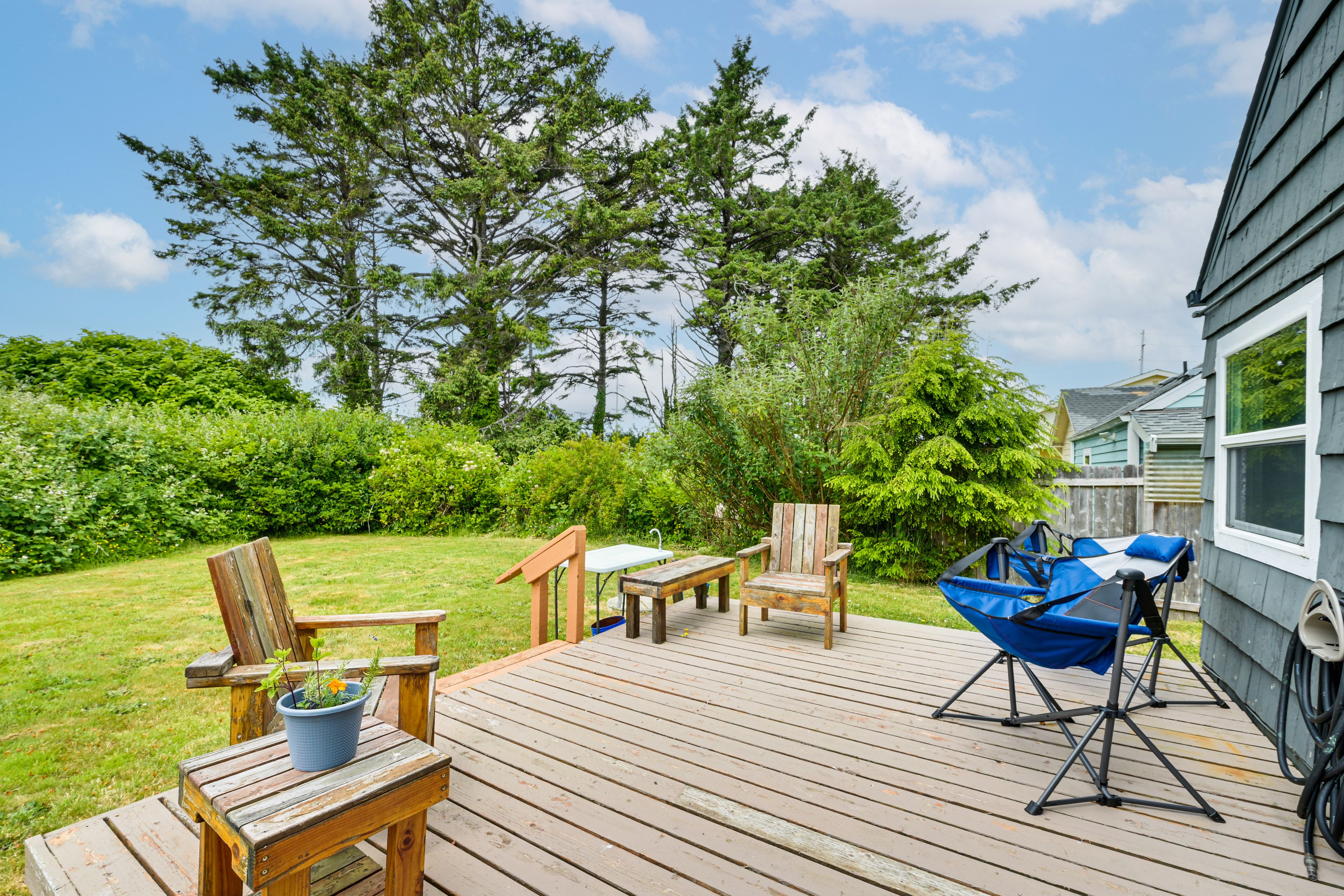 House Exterior | Deck w/ Seating | Private Backyard