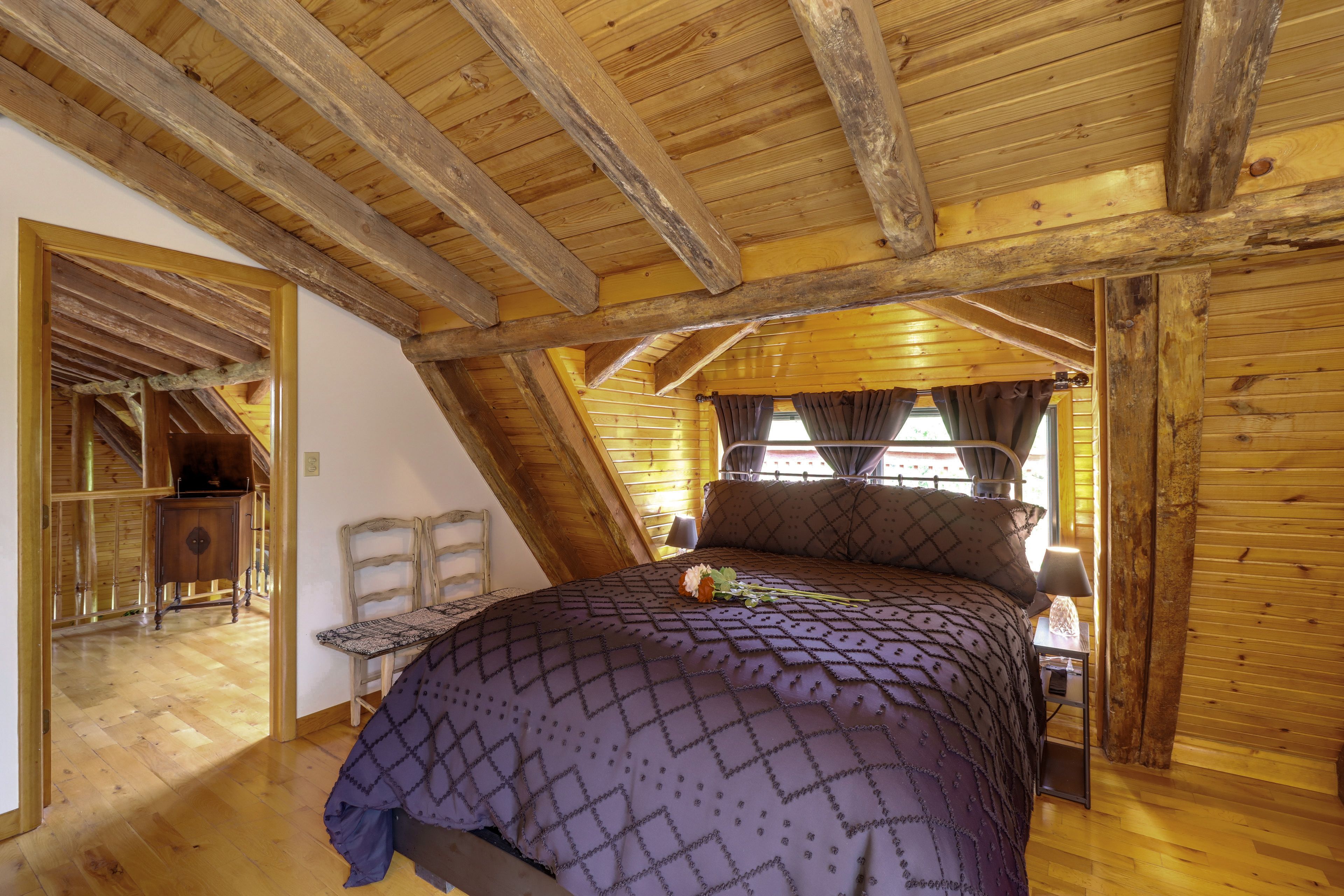 Bedroom Suite 1 | Queen Bed | Smart TV | Rooftop Deck Access | 3rd Floor