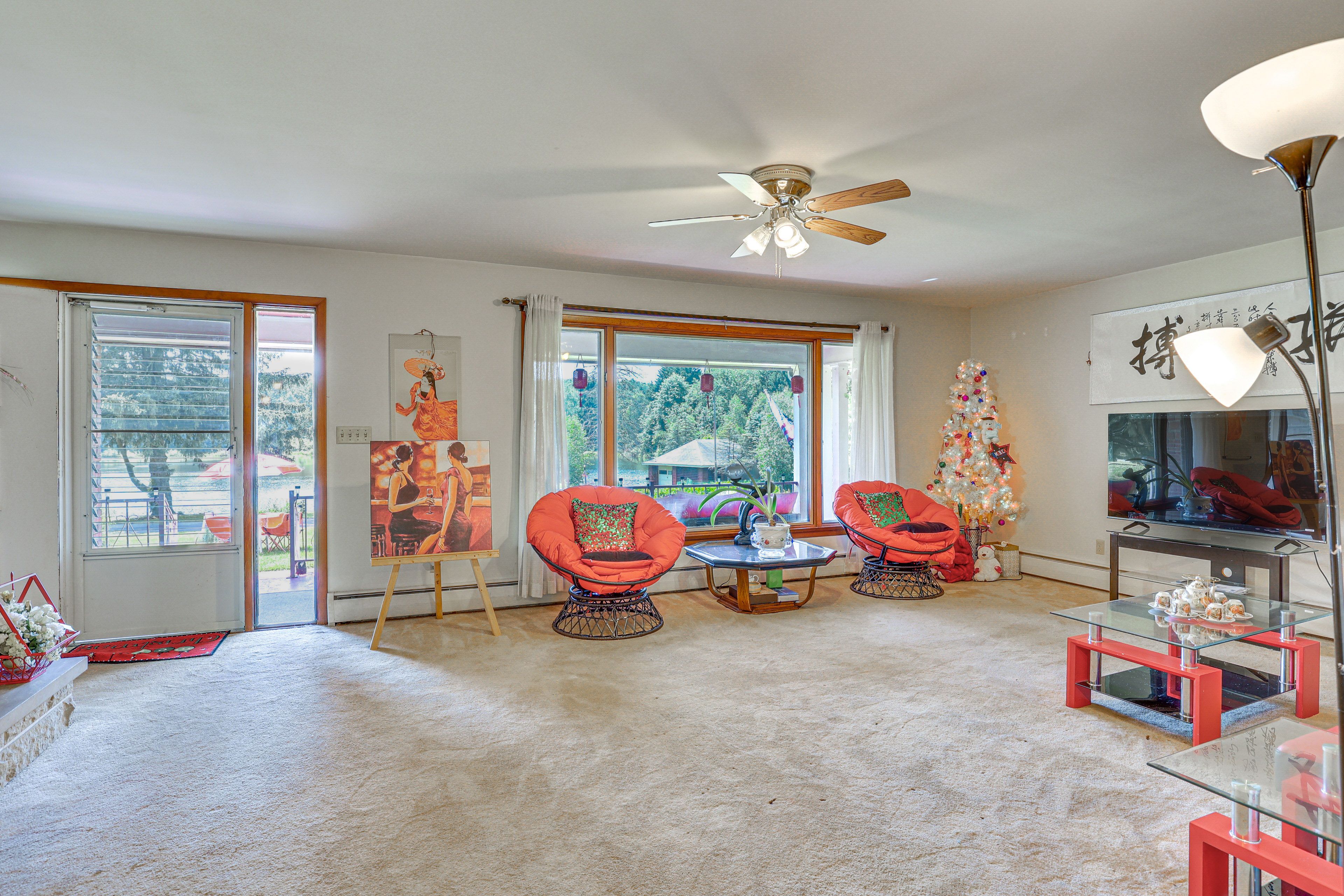 Living Room | Free WiFi | Central Heat | Wood-Burning Fireplace | 1st Floor