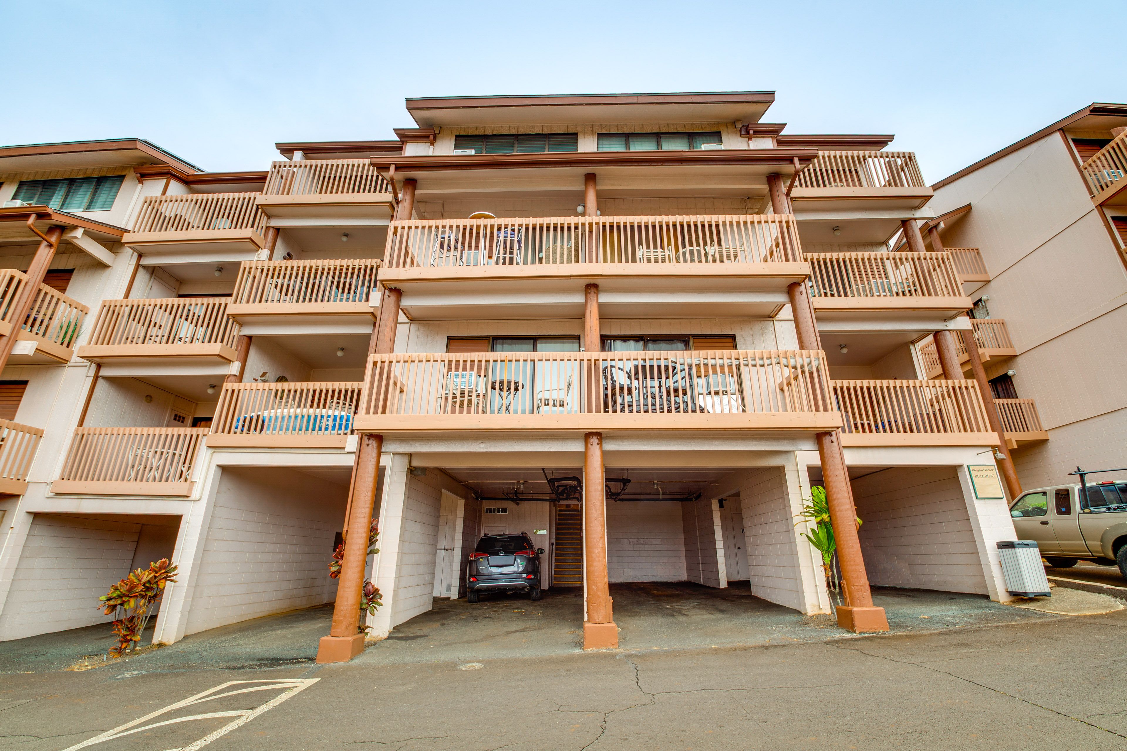 Parking | Garage (1 Vehicle) | Open Lot (3 Vehicles; First-Come, First-Served)