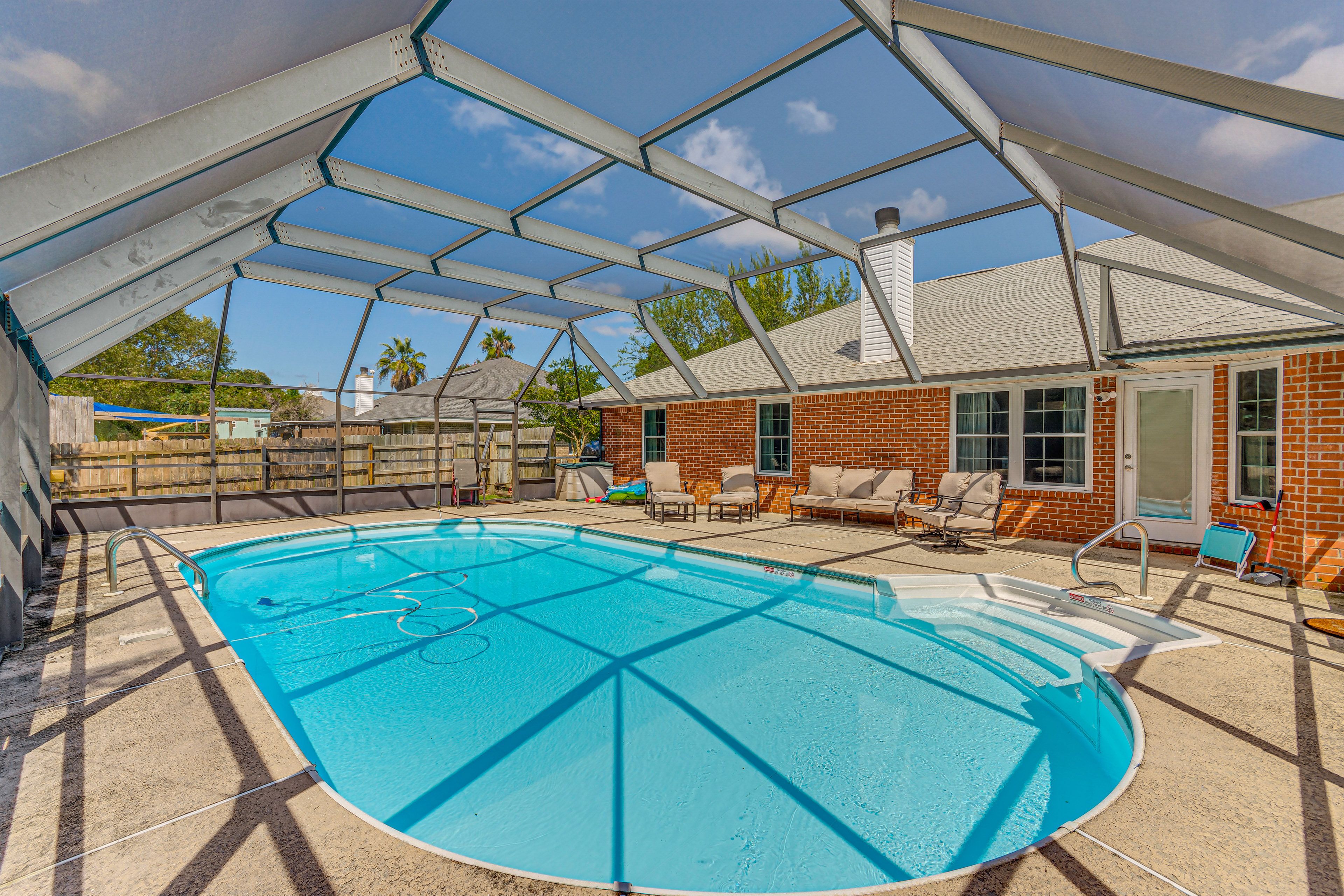 Screened-In Lanai | Private Pool (Heated w/ Fee) | Seating