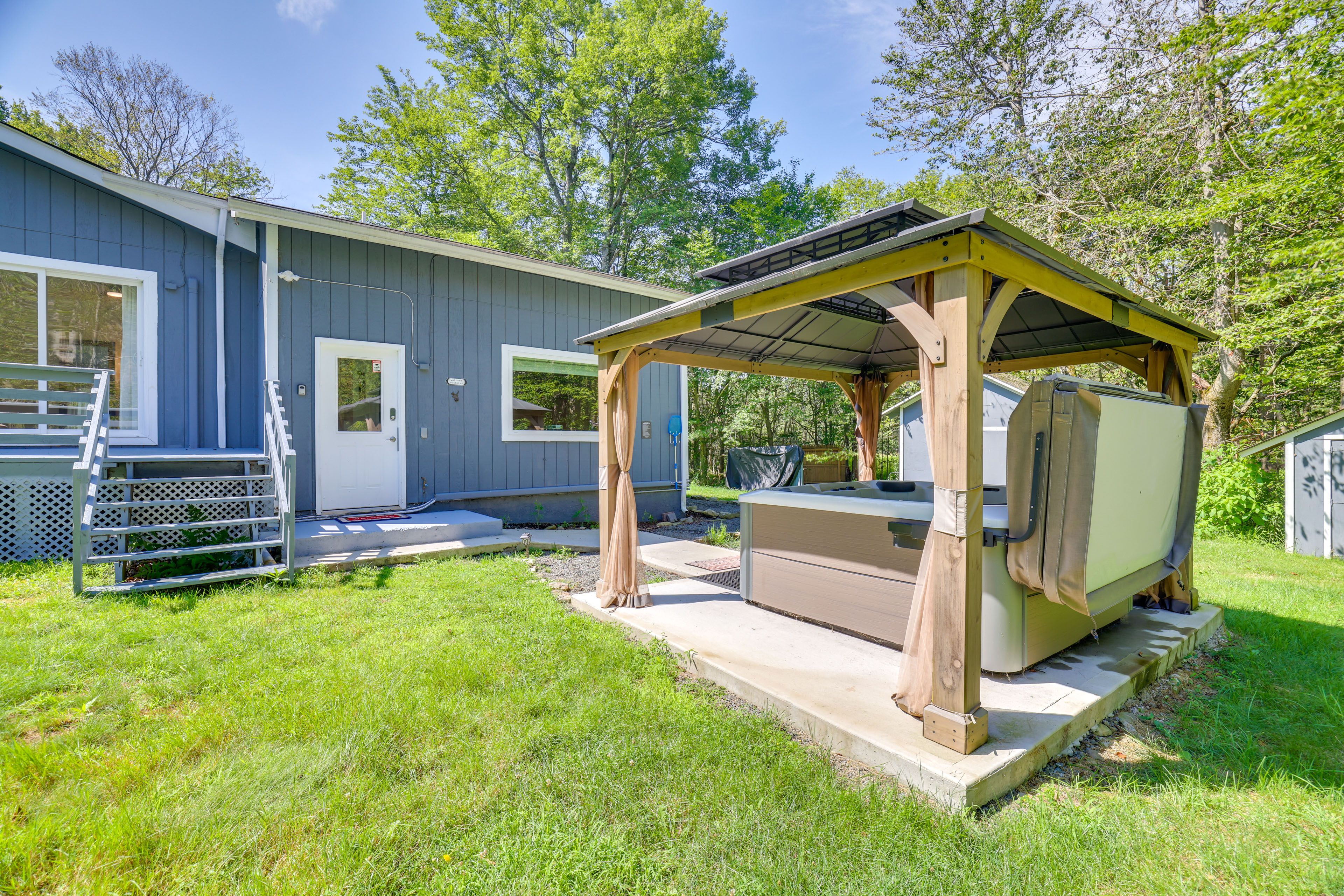 Backyard | Covered Hot Tub | Fire Pit