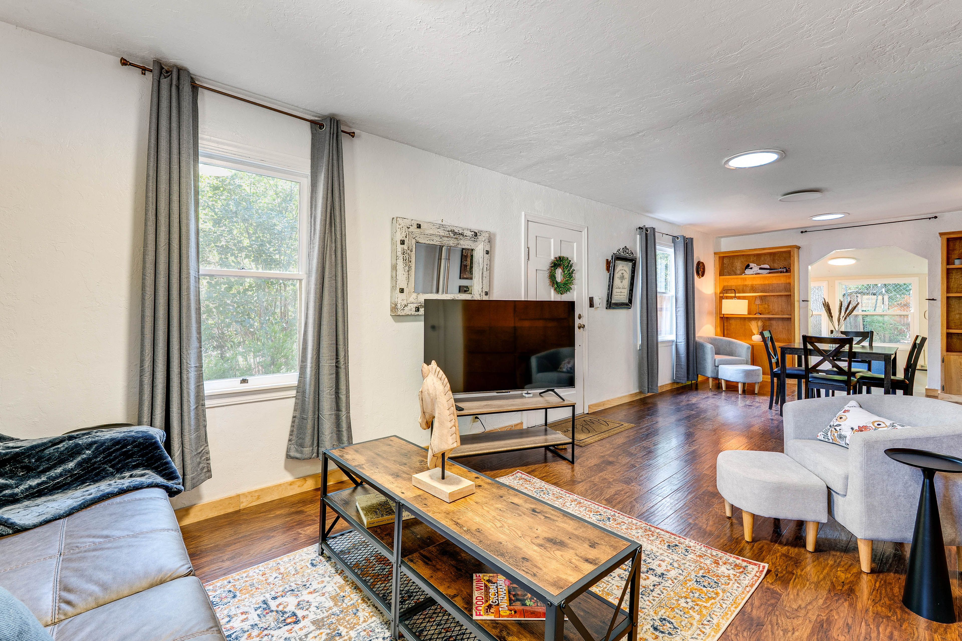 Living Room | Free WiFi | Space Heaters | Window A/C Unit | Queen Sleeper Sofa