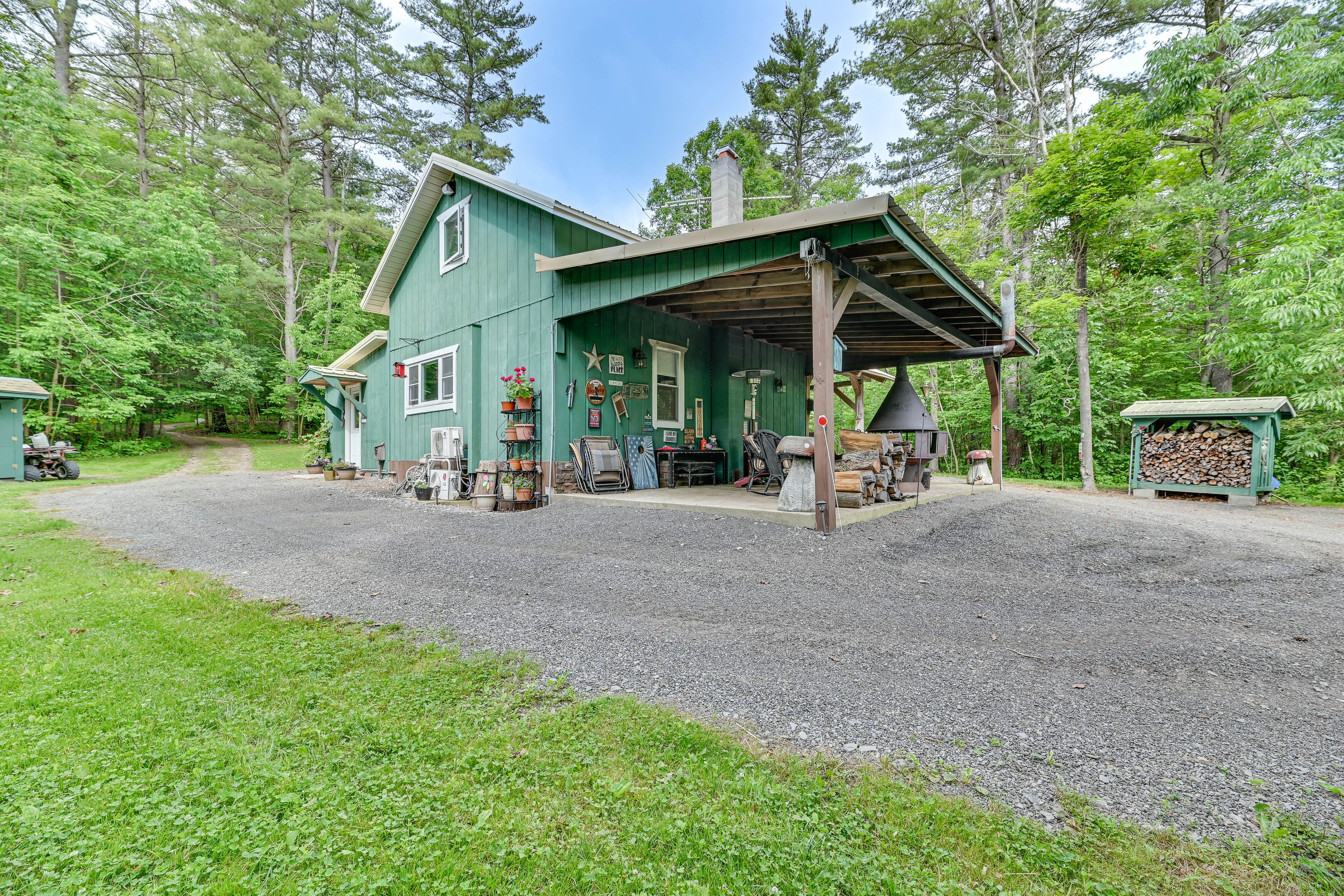 Property Exterior | 2-Story Cabin | Covered Front Patio
